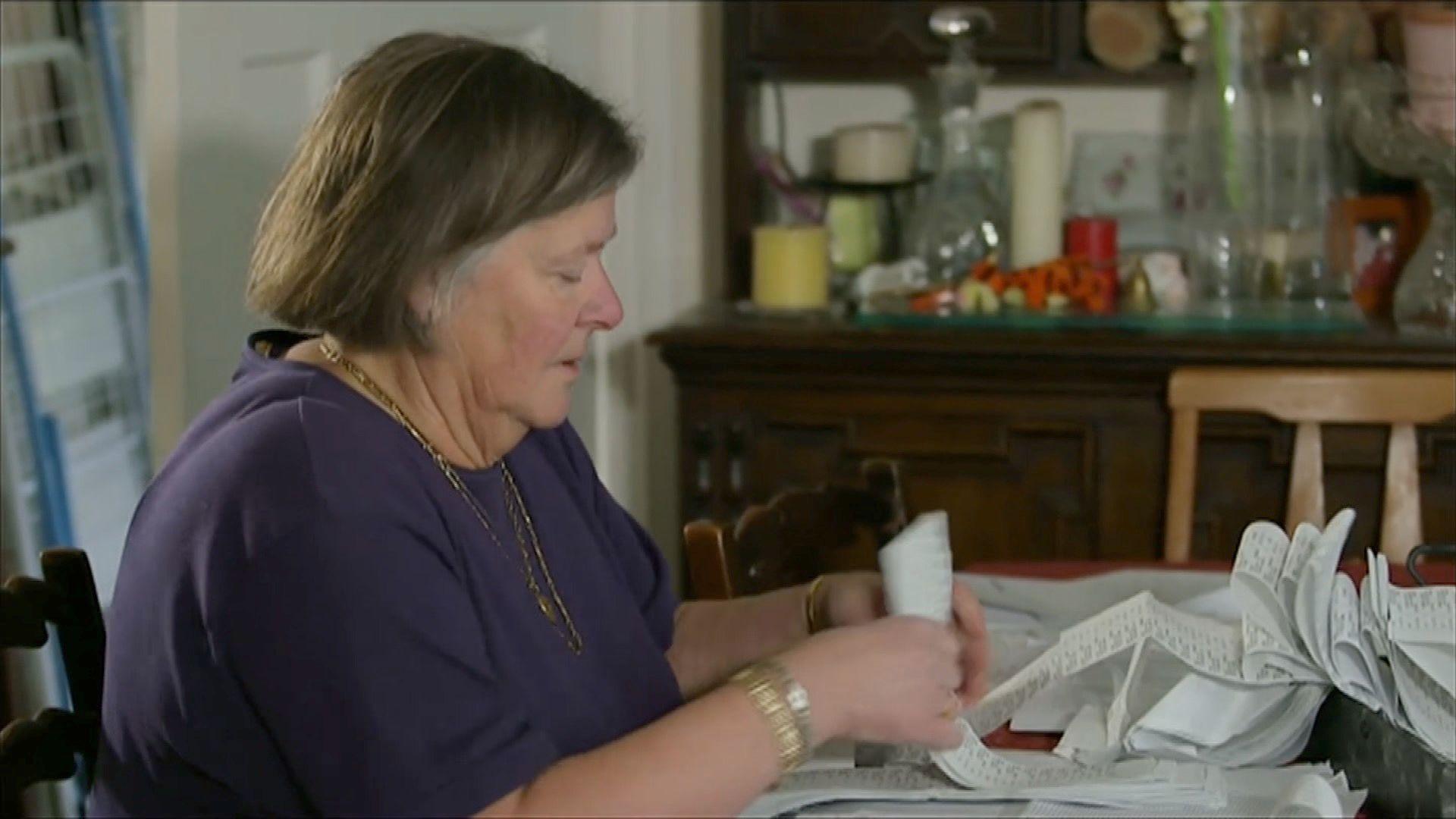 Pam Stubbs shows her paper records to the BBC in 2015