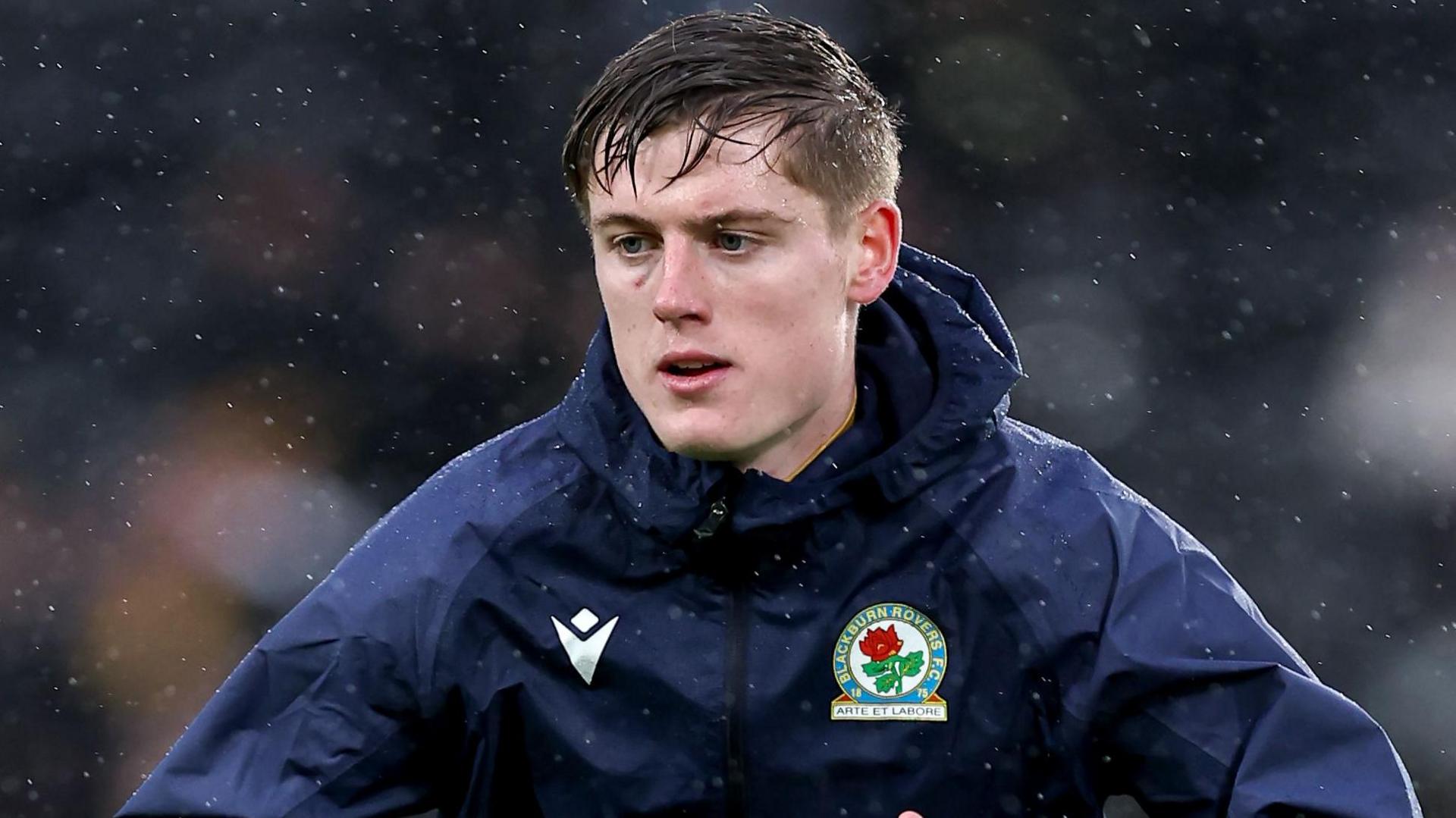Harley O'Grady-Macken, in training gear, warming up ahead of a Blackburn game last season