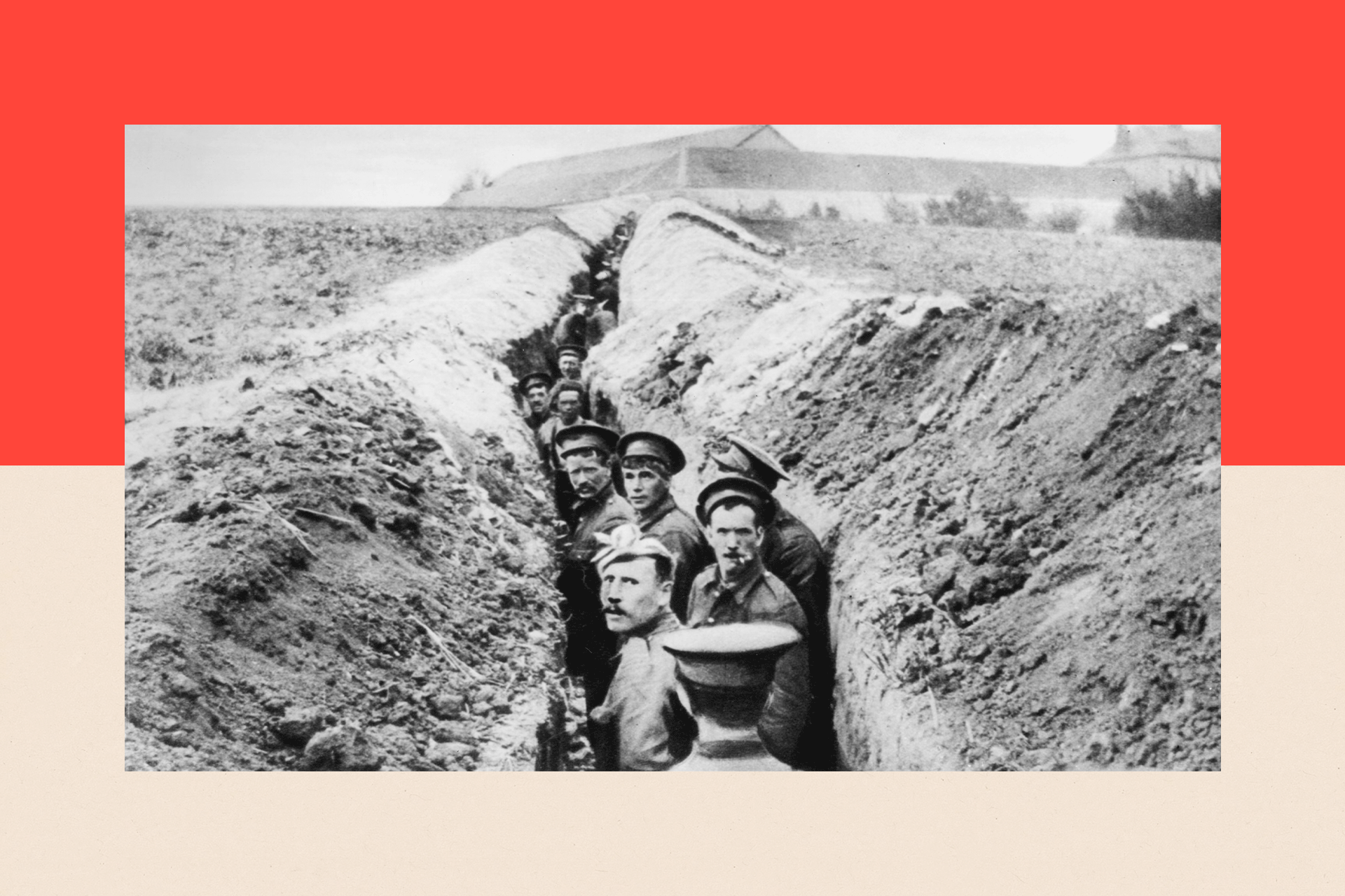 British soldiers lined up in a narrow trench during the First World War


