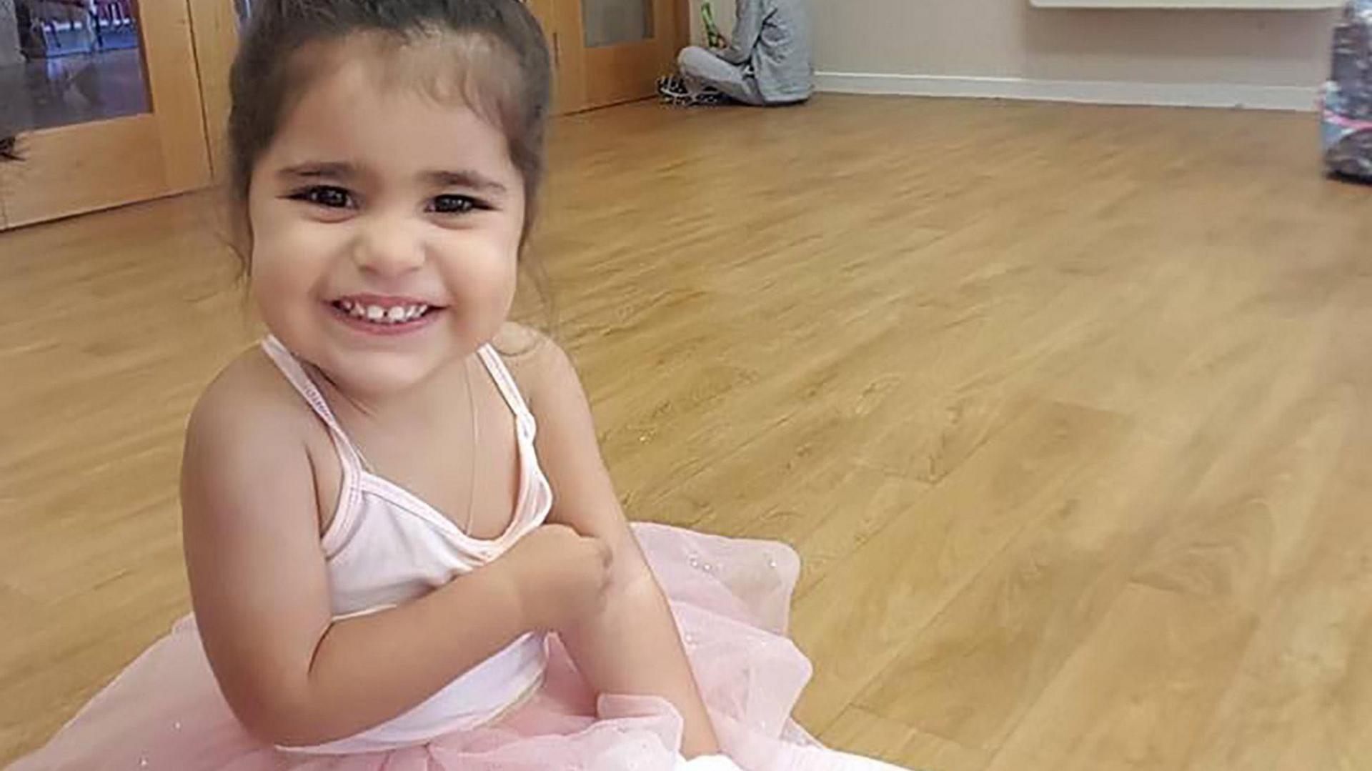 Alice Aguiar, pictured as a toddler, wearing a ballet outfit. She was enrolled in dance classes at 16-months-old.