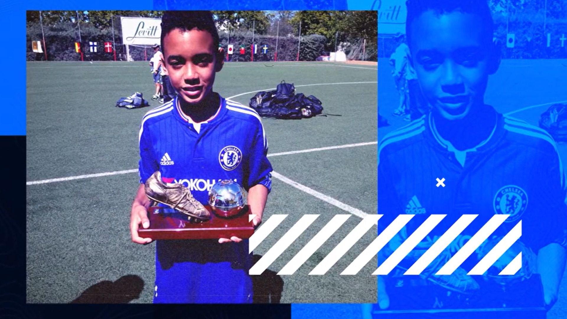 jamal musiala with a football trophy as a child