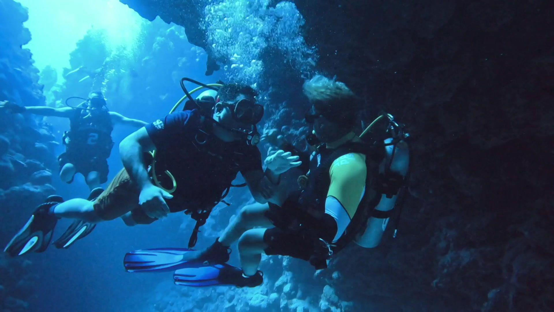 Salim and Shaun diving in canyon