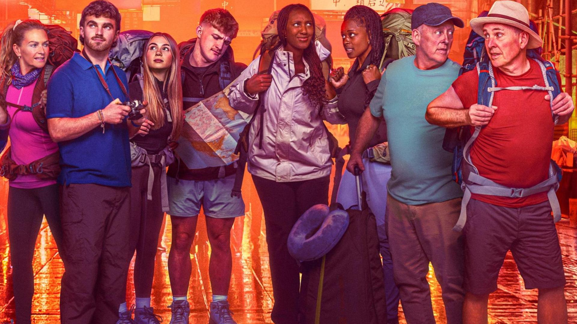 A promotional image where the cast of Race Across The World series 5 are stood together on a damp street