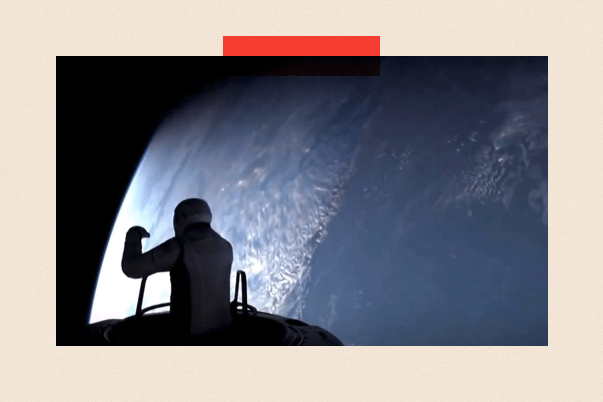 A still image taken from a video showing US entrepreneur and billionaire Jared Isaacman stepping out of the hatch at the start of the first private spacewalk