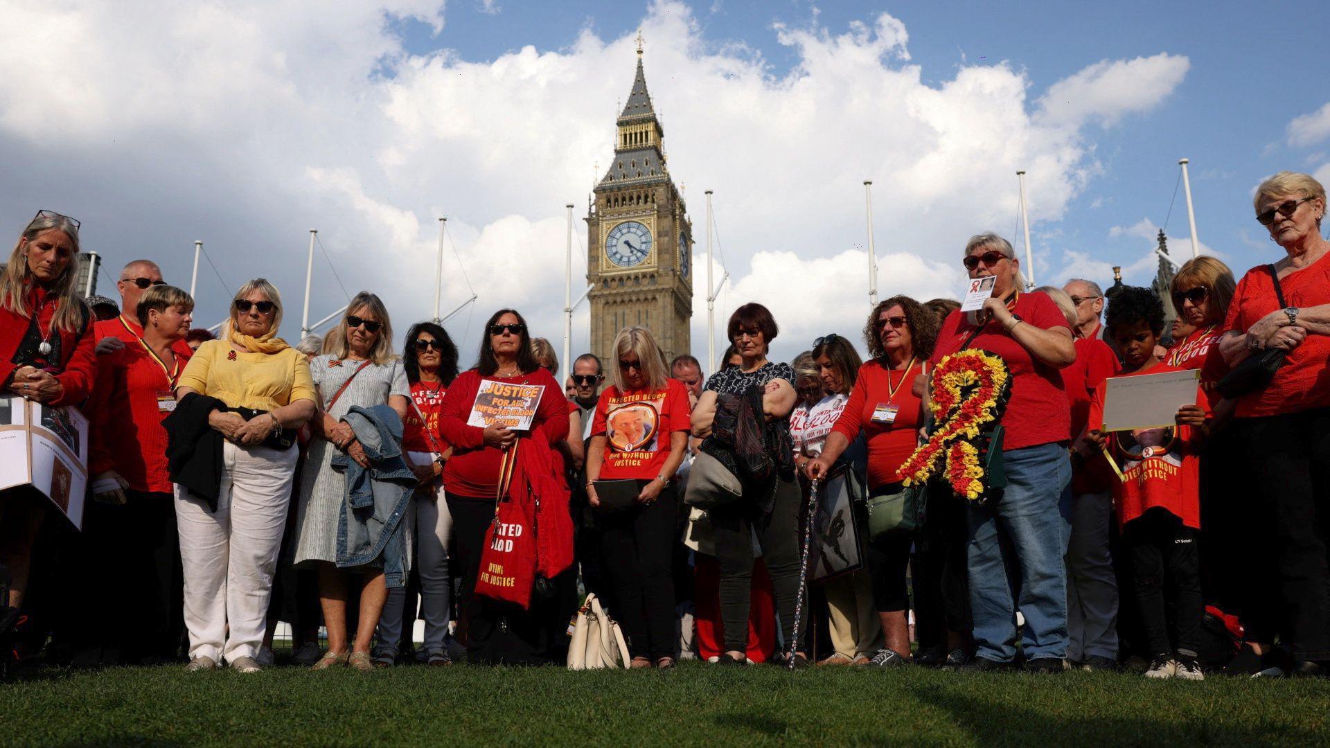 People impacted by the infected blood scandal, campaigning outside the Houses of Parliament