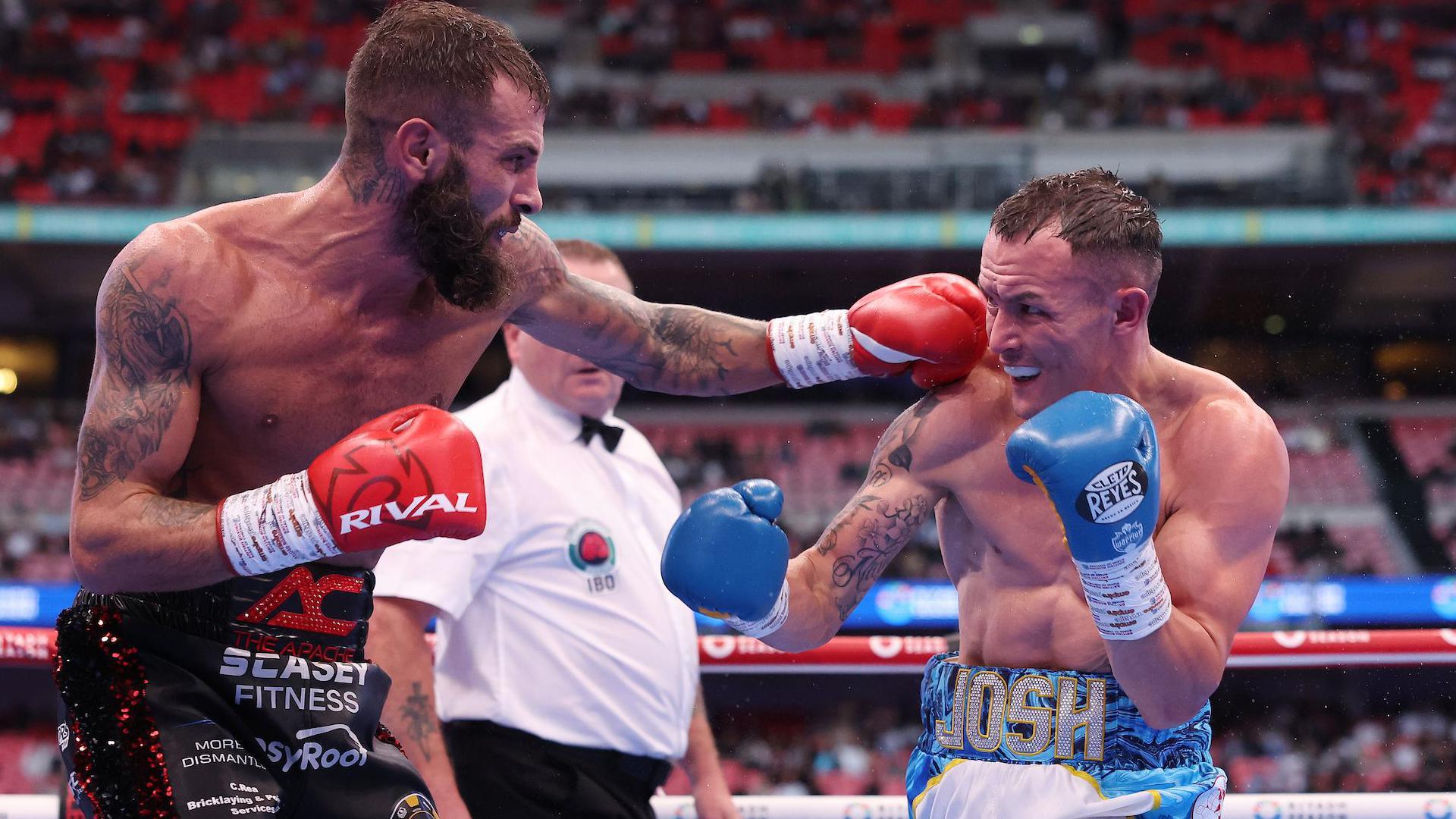 Action from Anthony Cacace v Josh Warrington at Wembley 