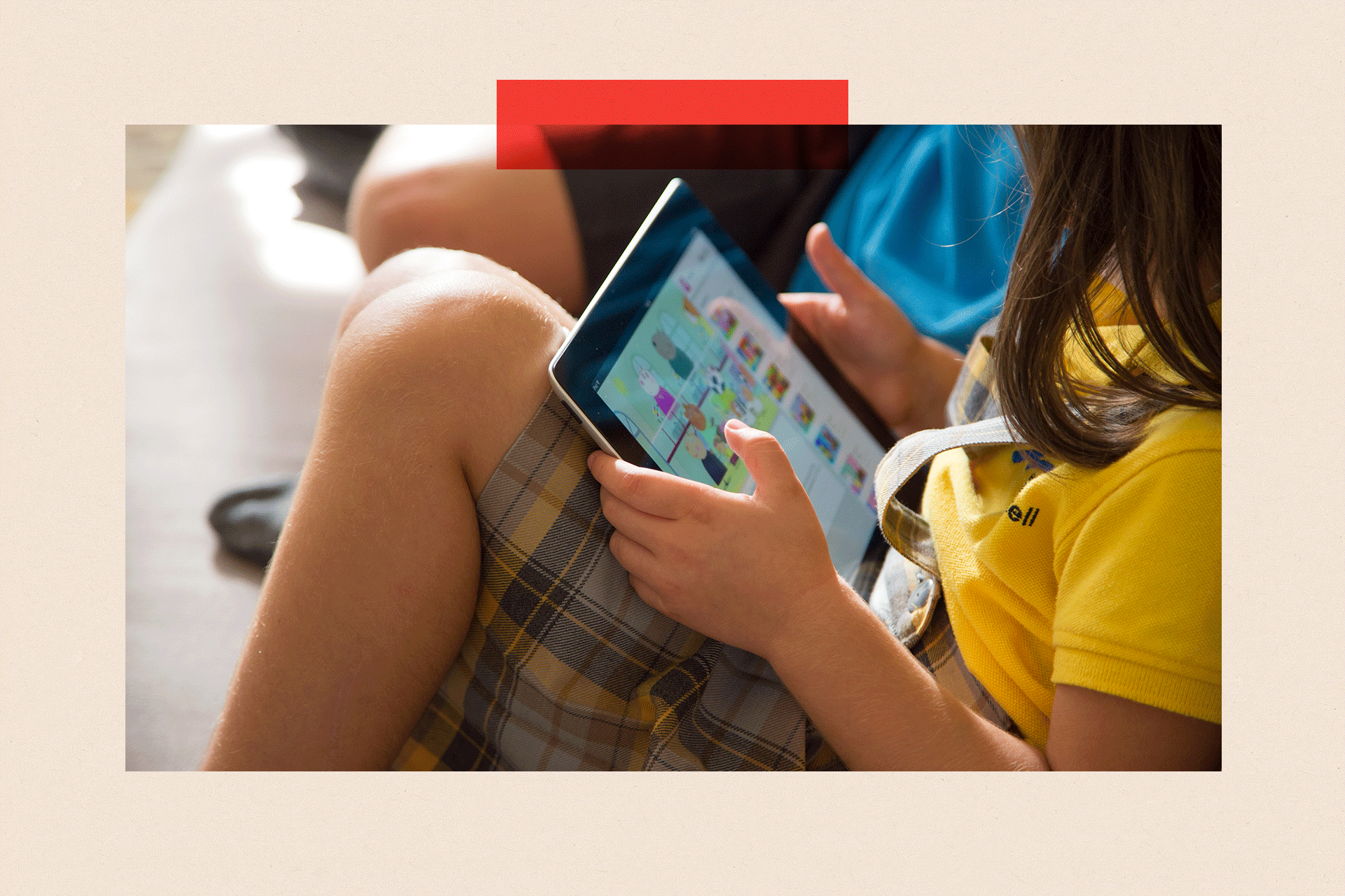 Children watching cartoons online with the iPad tablet 