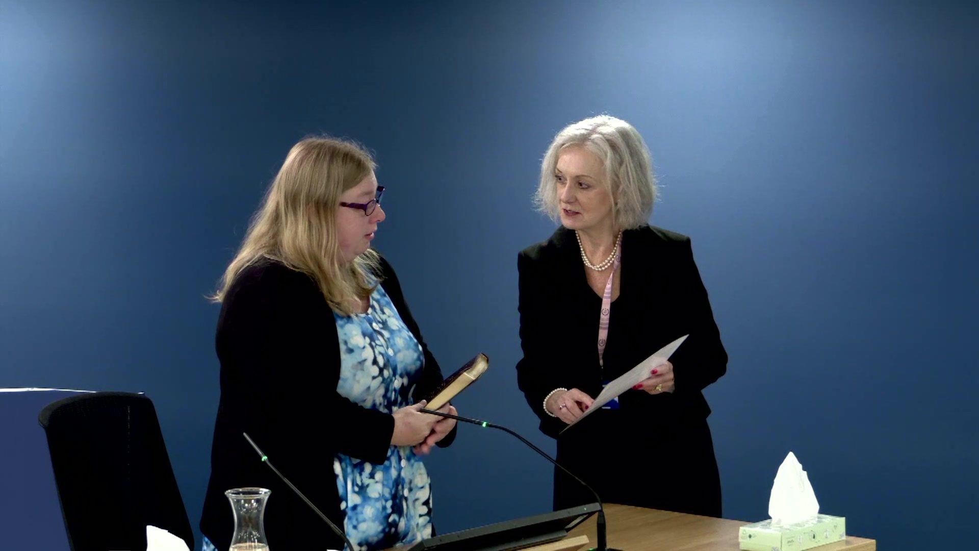 Tamsin Mullen being sworn in at the Covid Inquiry