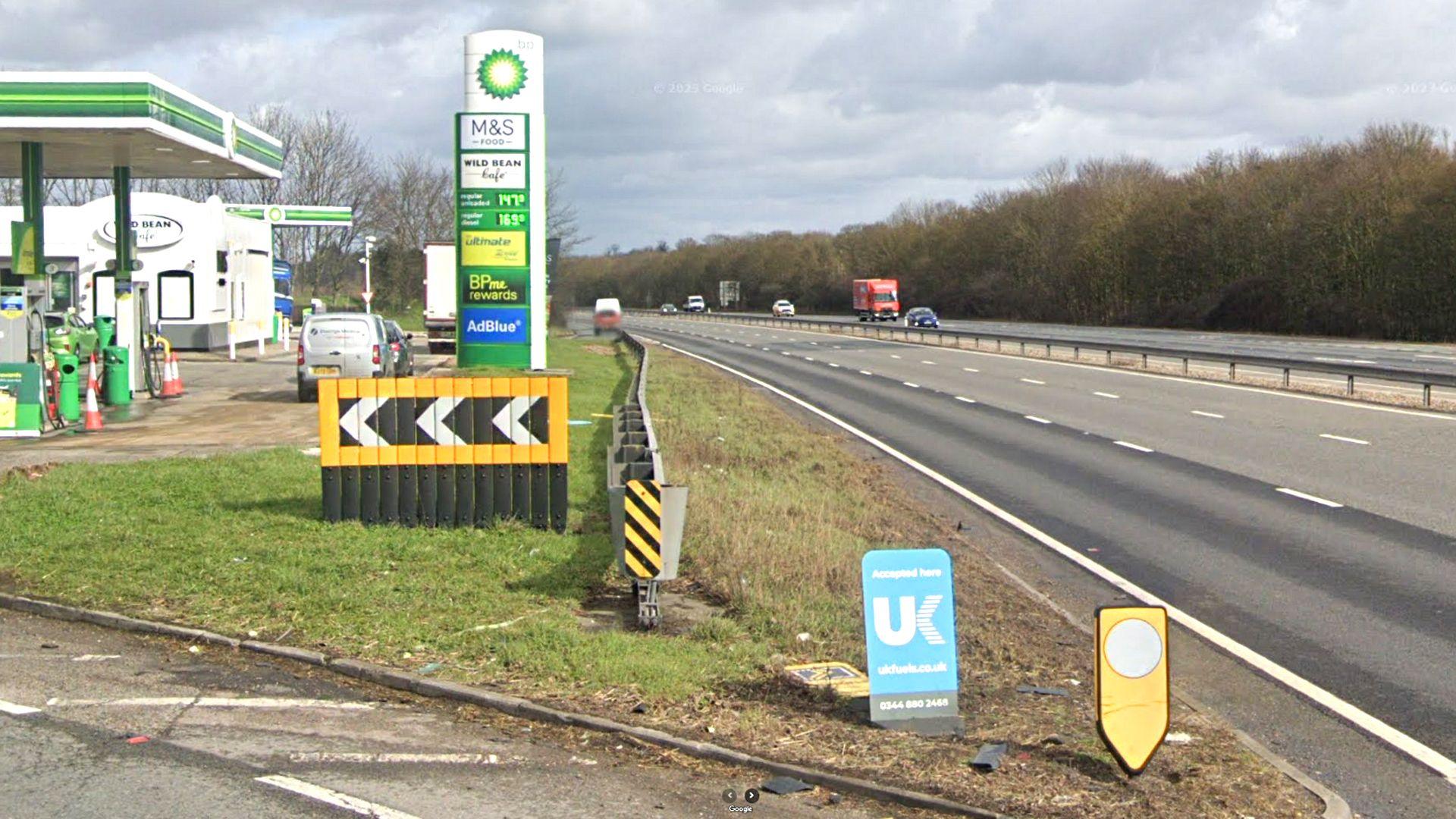 The Rowley Mile Services, showing part of the BP garage to the left and the three-lane A14 carriageway to the right.