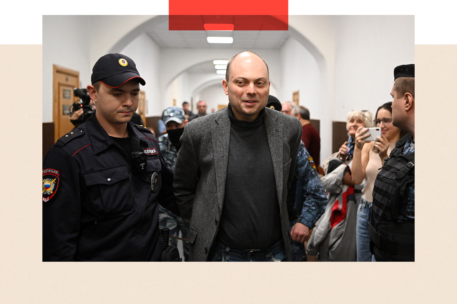 Russian opposition activist Vladimir Kara-Murza is escorted for a hearing at the Basmanny court in Moscow 