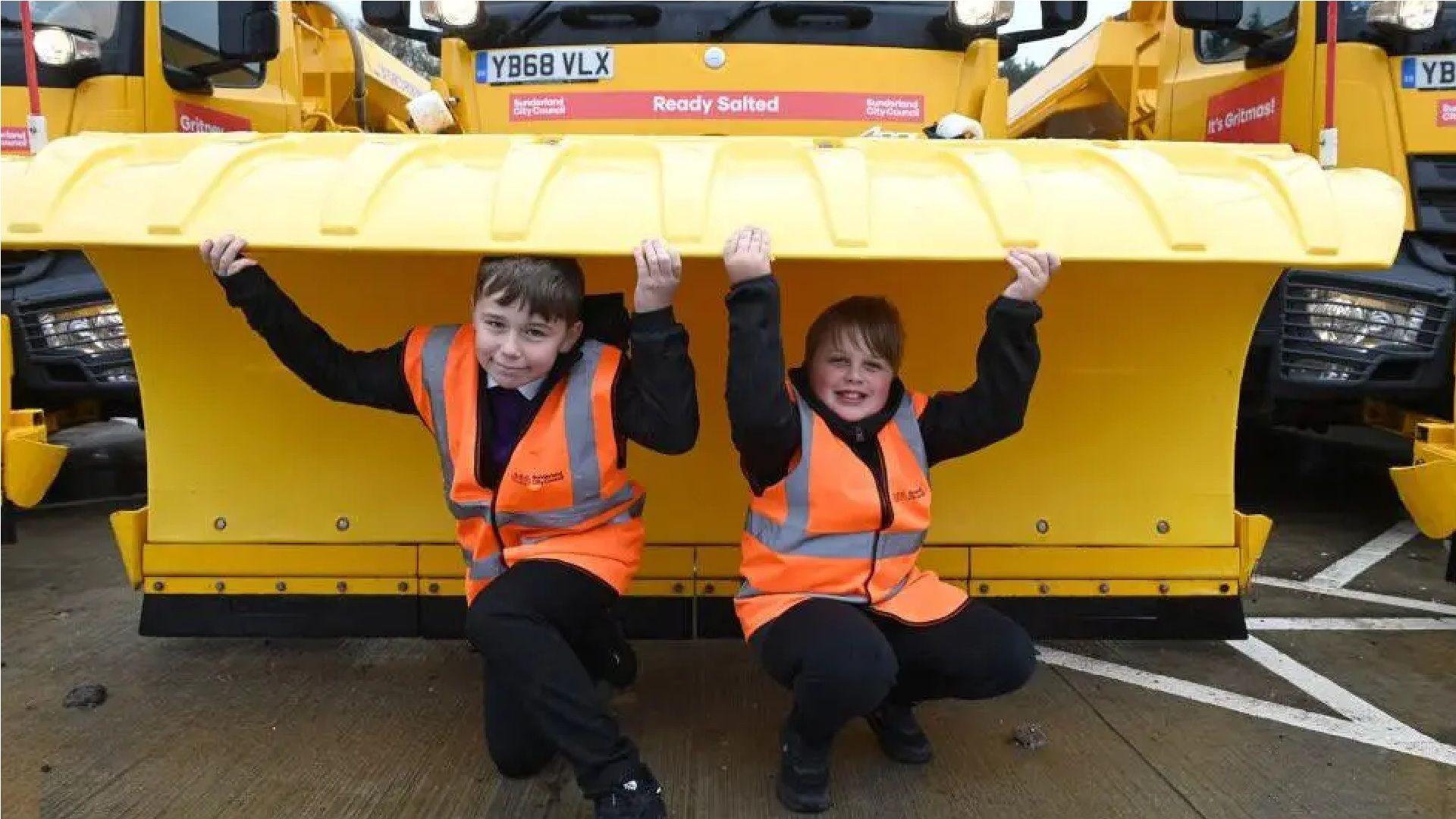 two children with a named gritter.