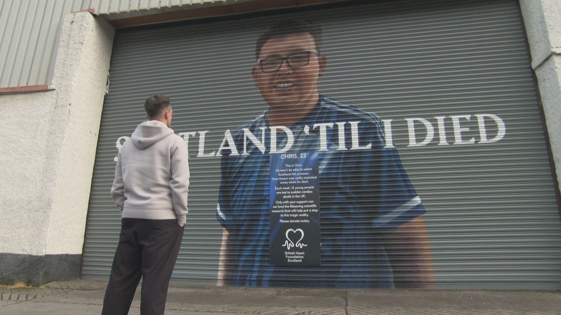 Lawrence Shankland looks at his friend's mural