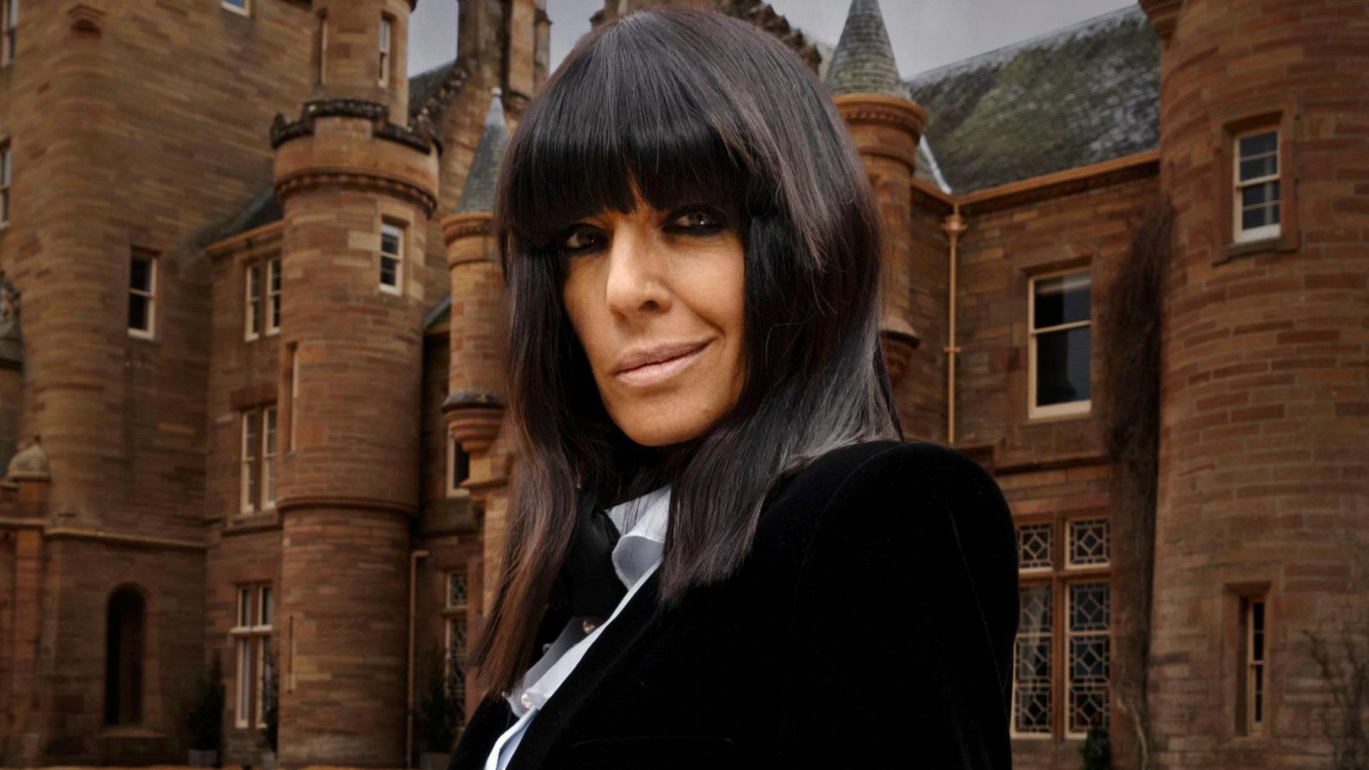 Claudia Winkleman standing outside Ardross Castle