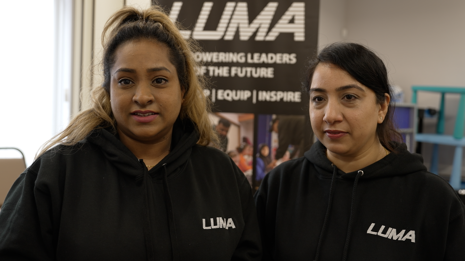 Ayesha and Ranjna, both of whom are wearing black hoodies