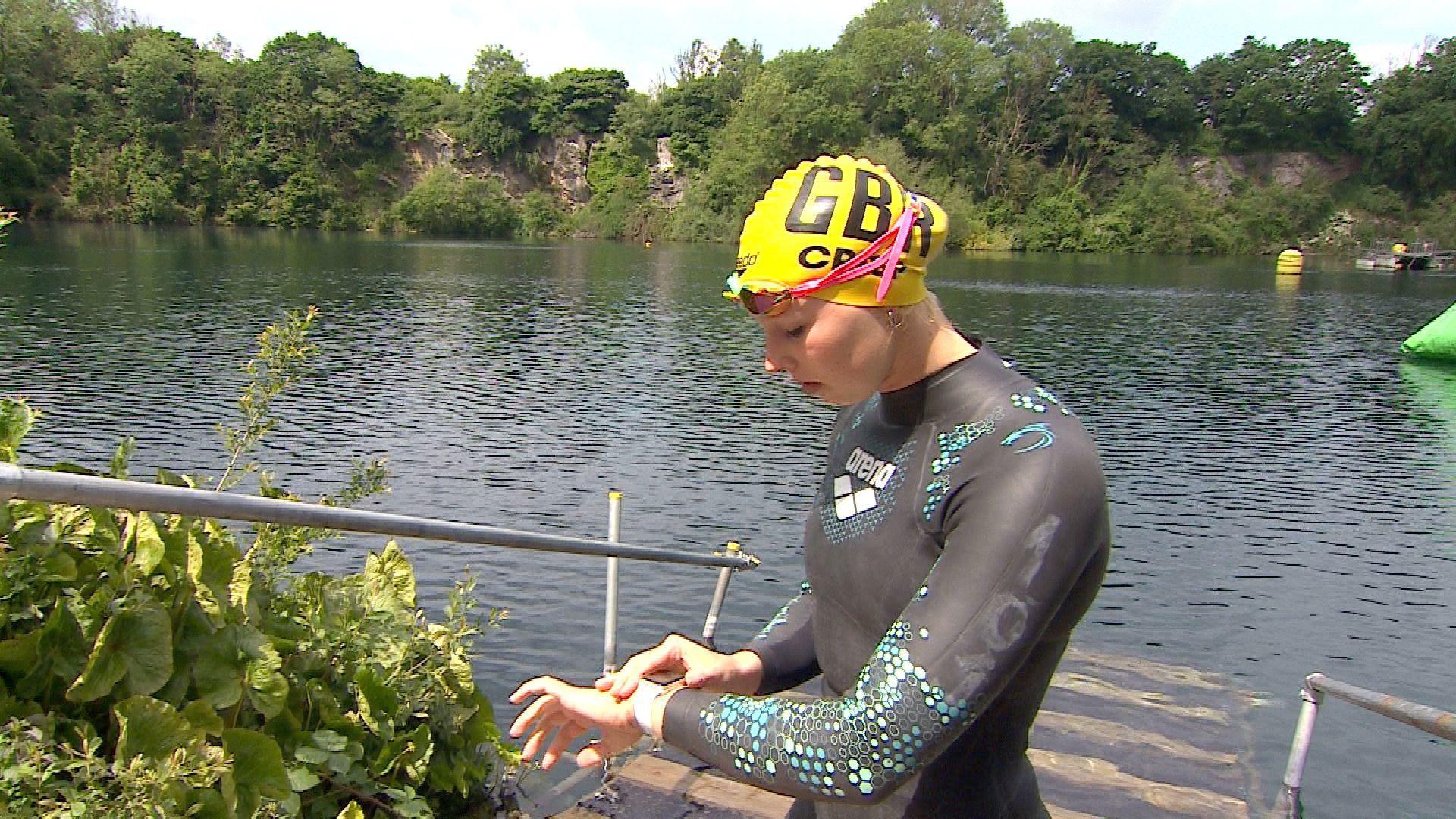 Leah Crisp getting ready to swim in open water