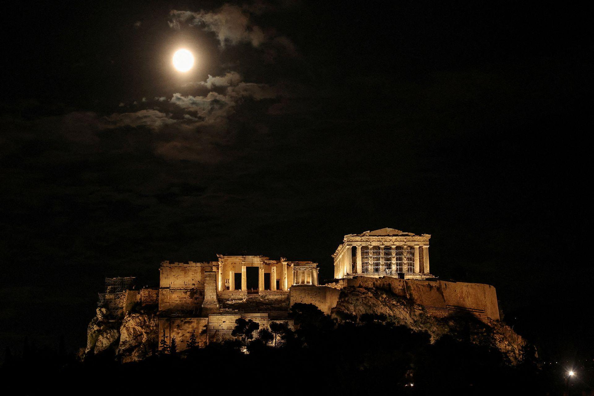 The "Beaver Moon" supermoon appears above the Acropolis in Athens, Greece, November 5, 2025. 