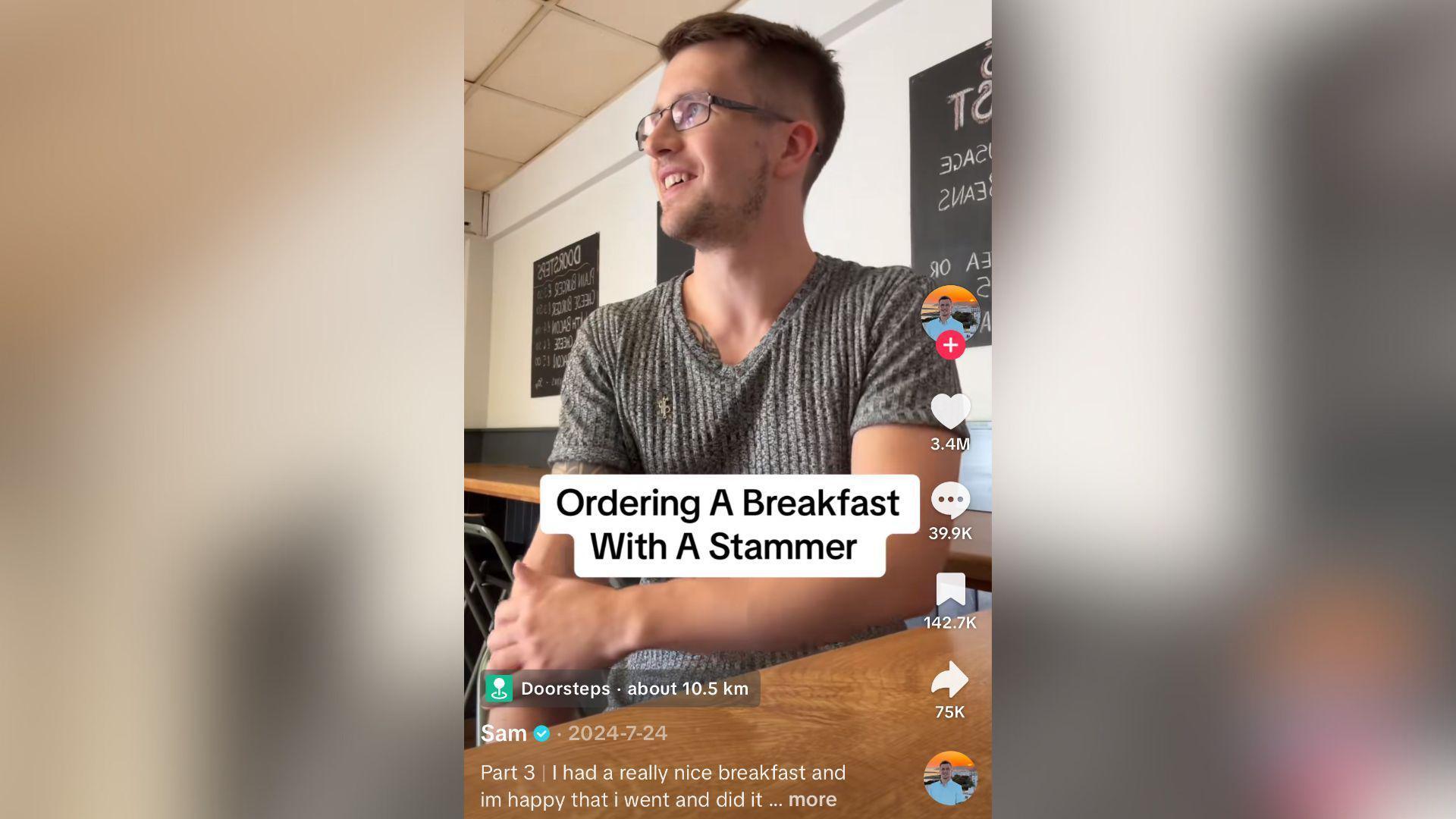 A screenshot of one of Sam Bagshaw's videos on TikTok, which is captioned: "Ordering a breakfast with a stammer". He is recording himself sat at the counter of a cafe. In the description of the video he has written: "I had a really nice breakfast and I'm happy that I went and did it." The video has been liked 3.4m times, and 40,000 people have left a comment.