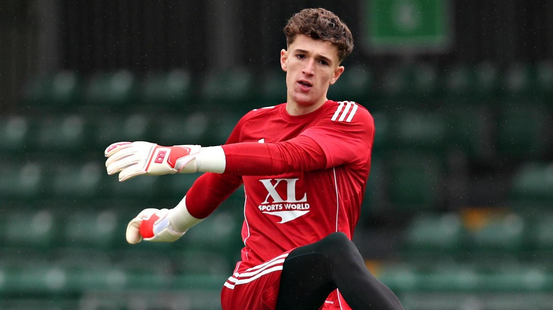 Kit Margetson warming up before a Connah's Quay Nomads game 