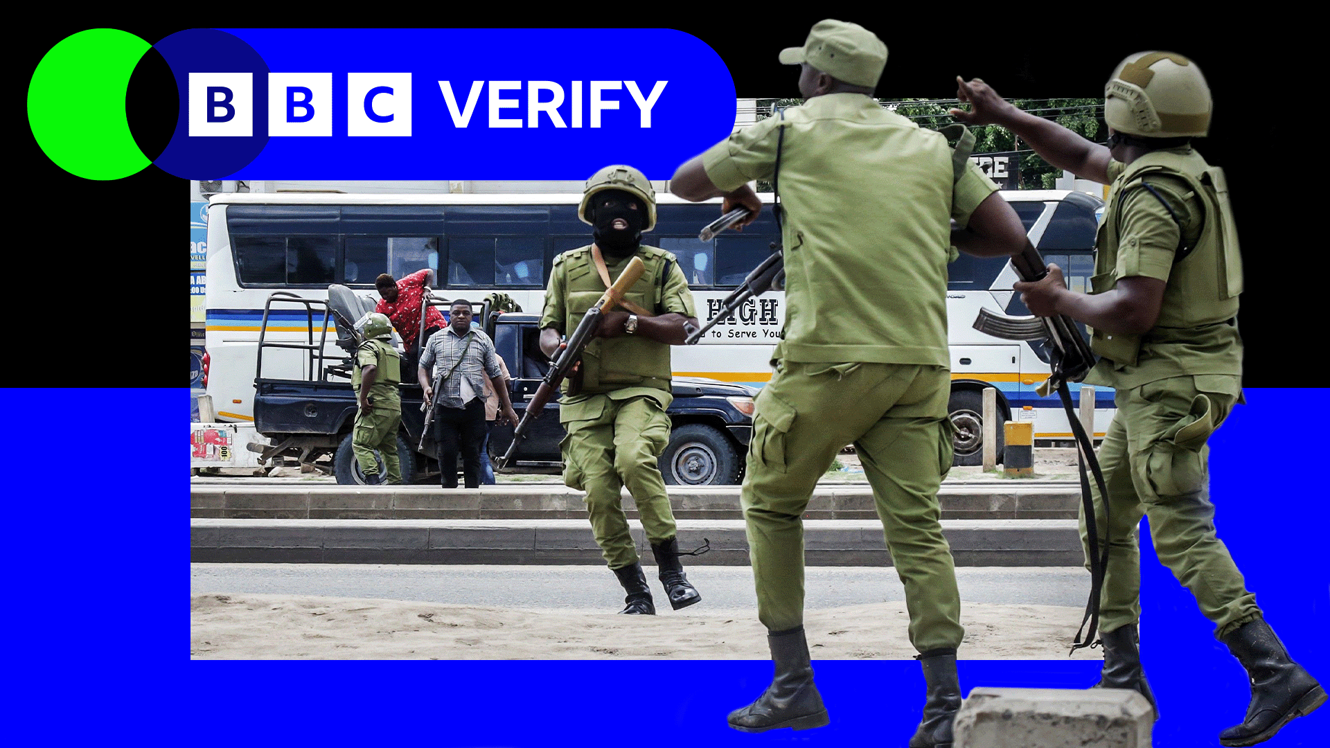 Armed Tanzanian police stand in the streets as demonstrations continue around them.