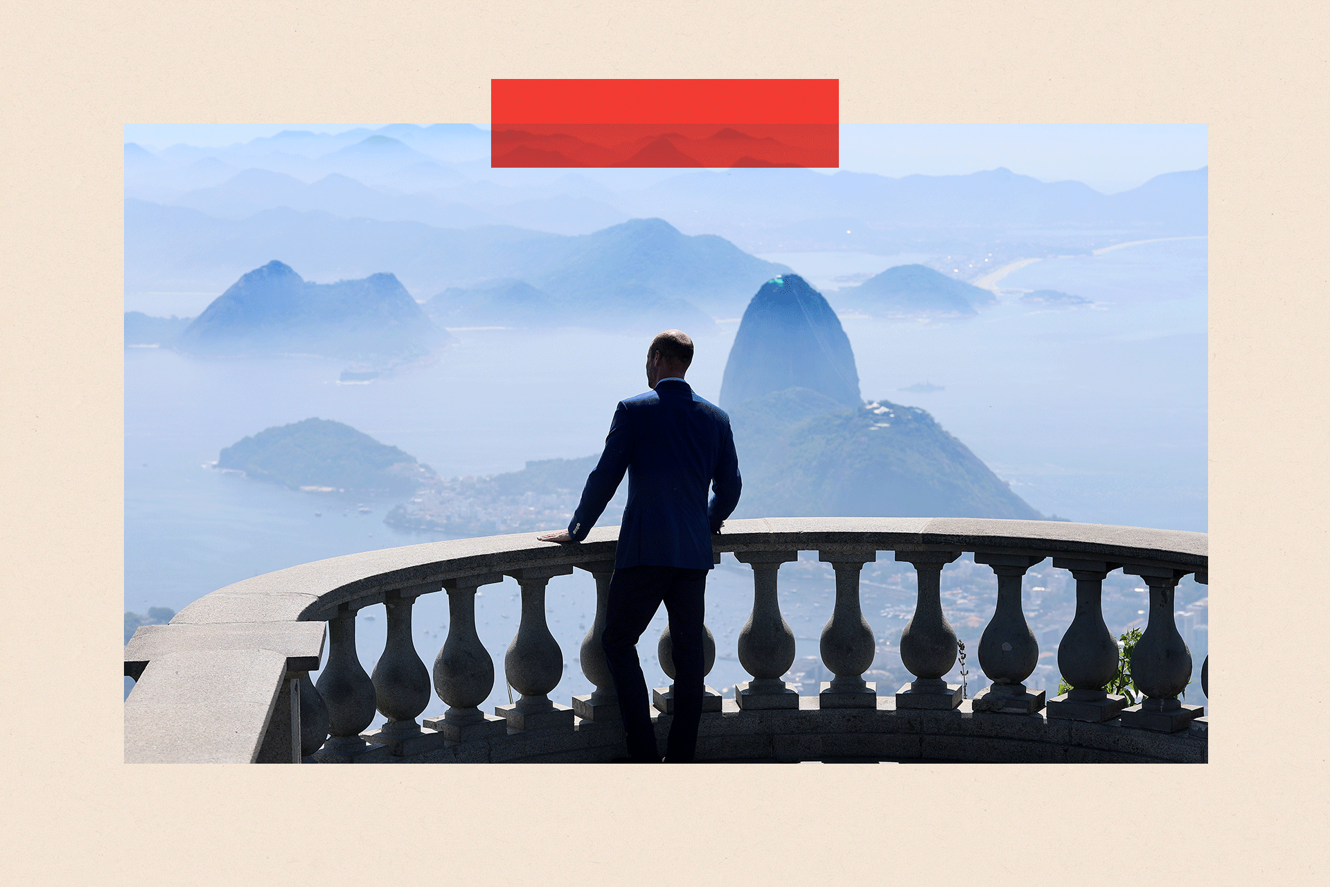 Prince William looks out towards Sugar Loaf Mountain on a balcony