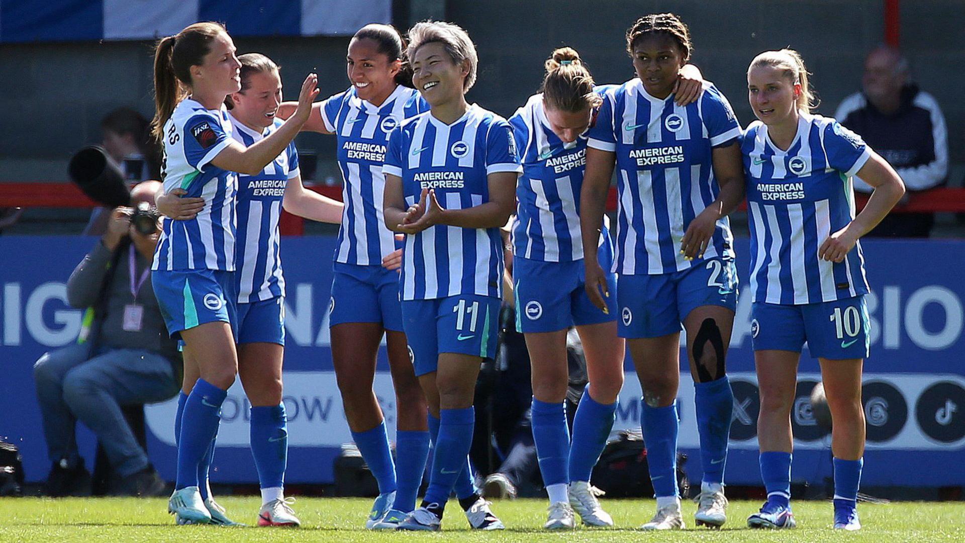 Brighton & Hove Albion's Madison Haley celebrates scoring their third goal with teammates