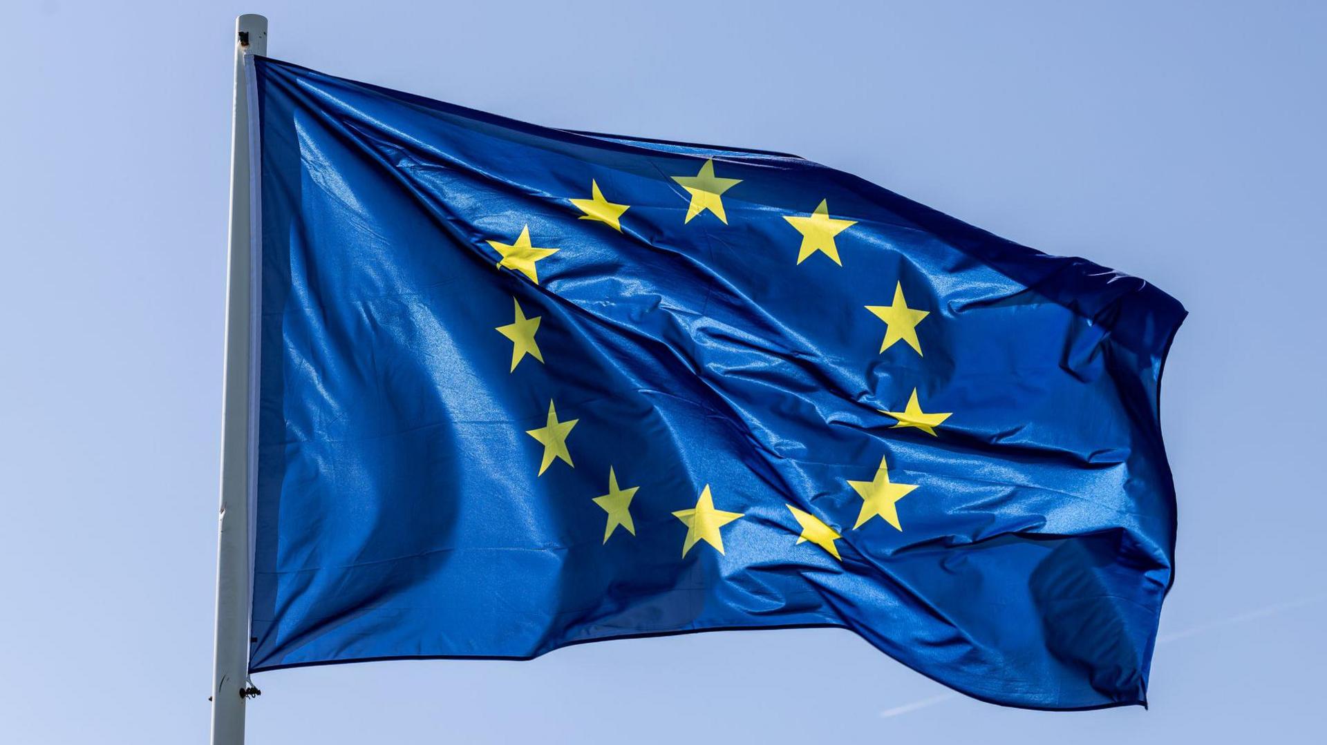A European Union flag.