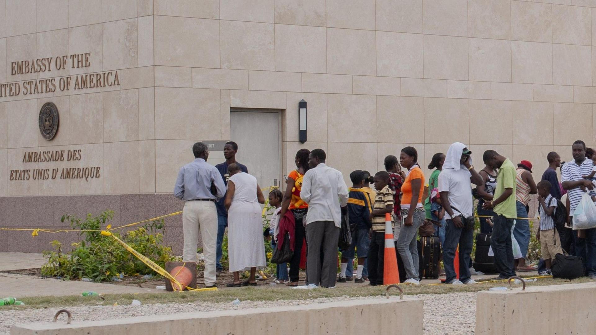A crowd lines up outside the American embassy in Haiti 
