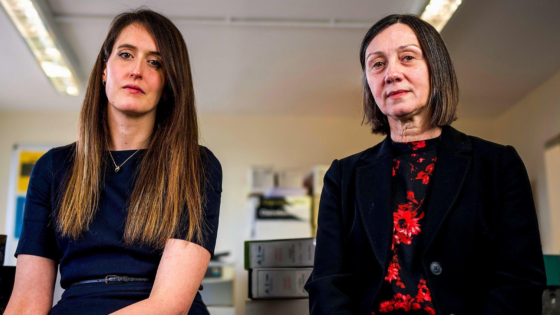 Cold Case Investigators promotional shot featuring two women in an office surrounded by files 