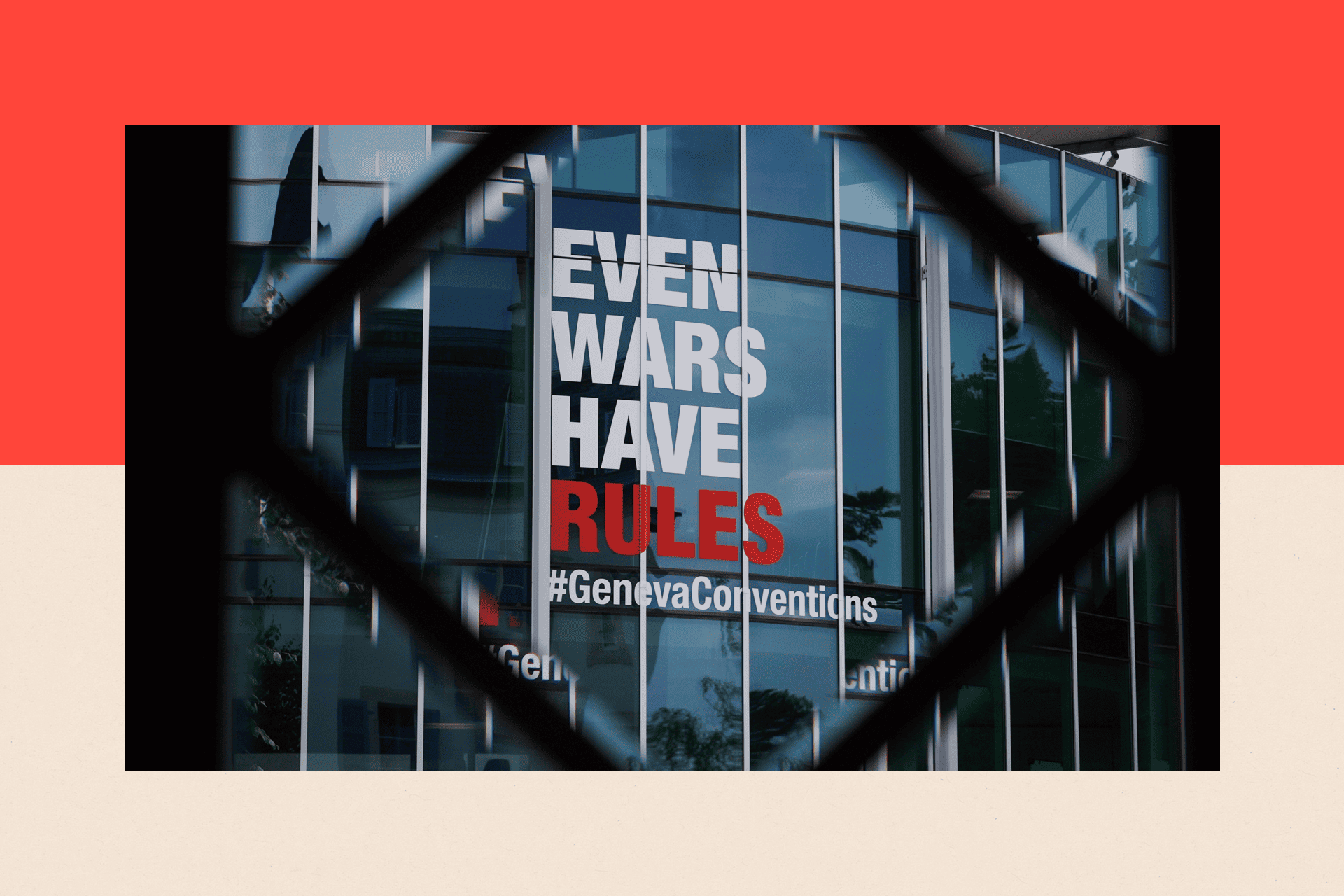 A sign saying 'Even Wars Have Rules' on a glass rotunda