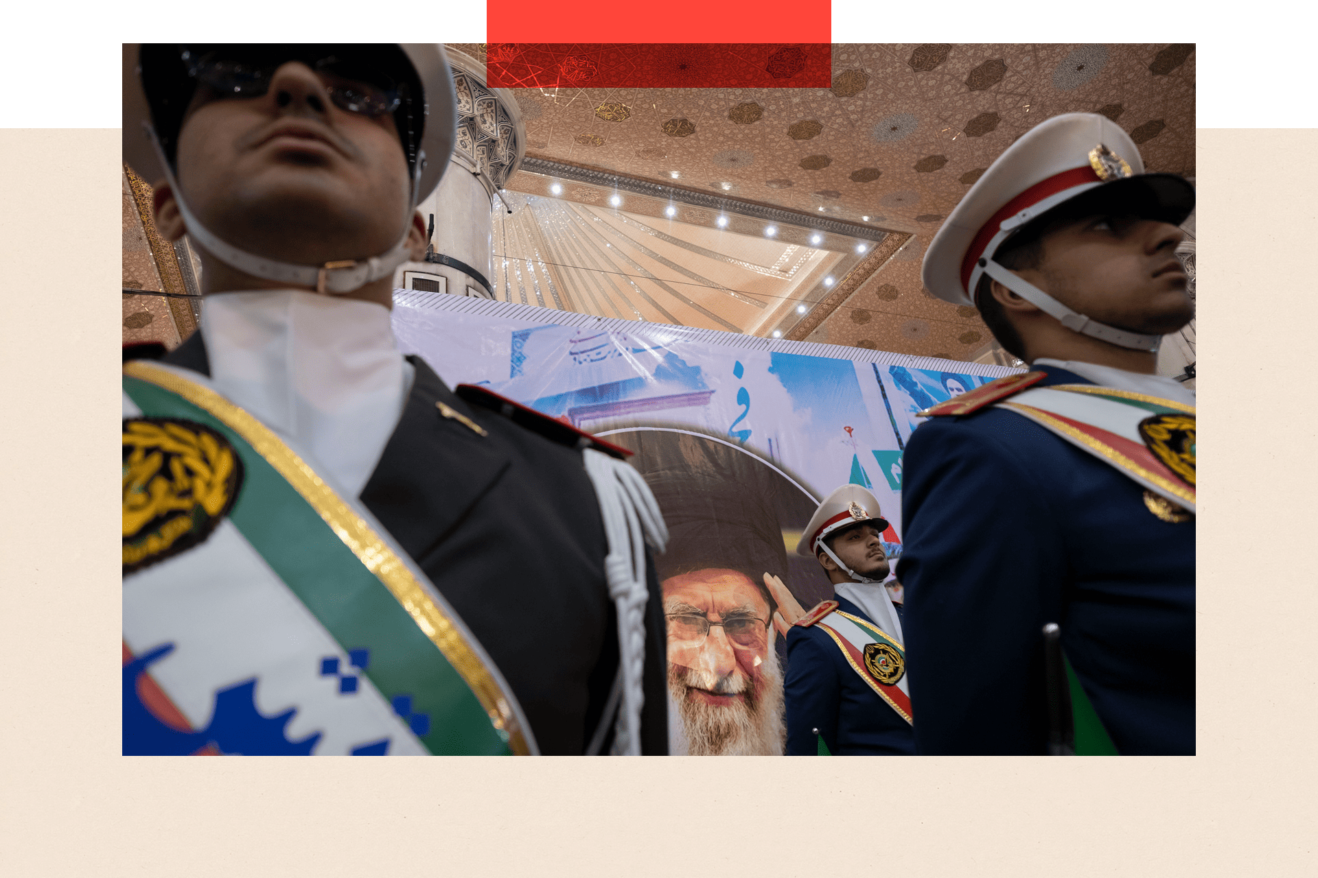 Members of the Iranian Army honour guard stand guard in front of a portrait of Iran's Supreme Leader Ayatollah Ali Khamenei during a ceremony in southern Tehran, on 1 February 2024.