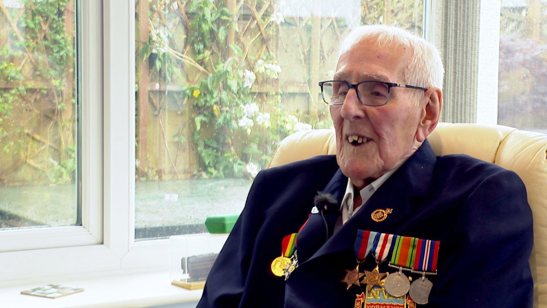 Bill Johnston with medals