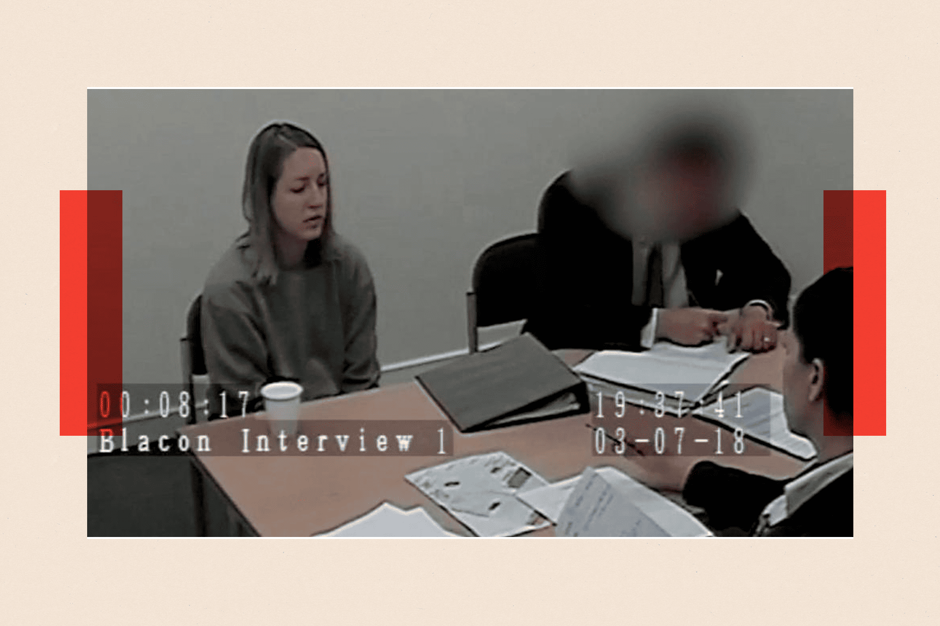 A video snapshot of Lucy Letby while being questioned in an interrogation room
