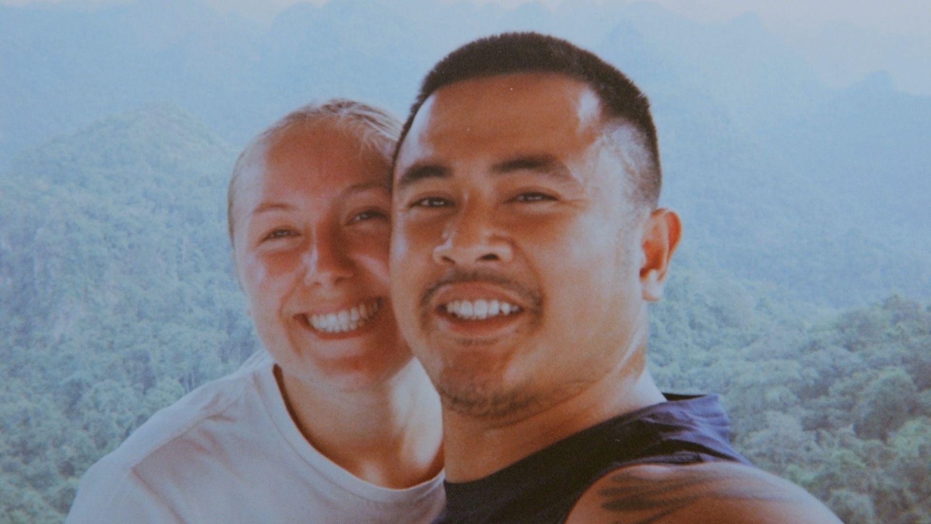A photo of Ike and his girlfriend, Saskia. Hugging and smiling in a selfie picture. Saskia has her blonde hair tied back wearing a white t-shirt and a Ike has black short hair wearing a black vest.