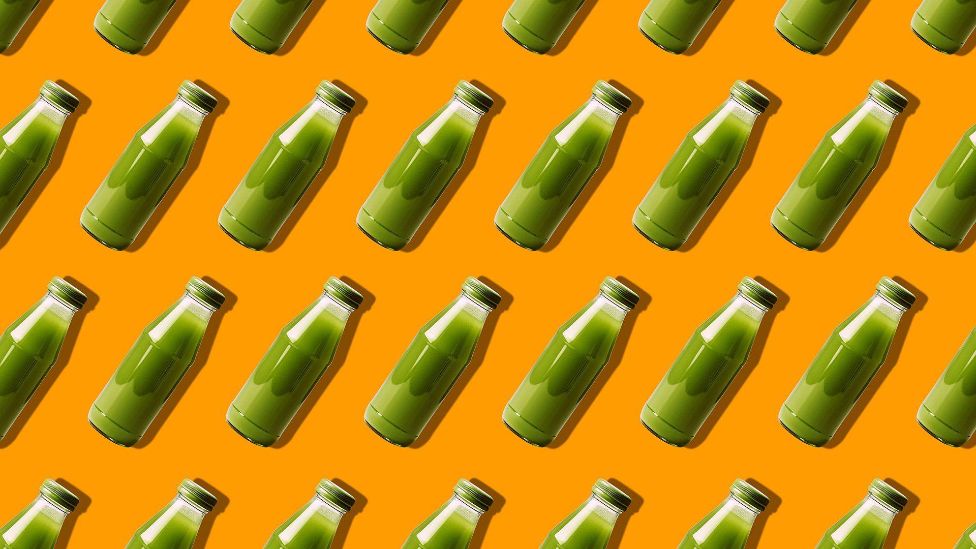 Smoothie and juice bottles pattern on an orange background