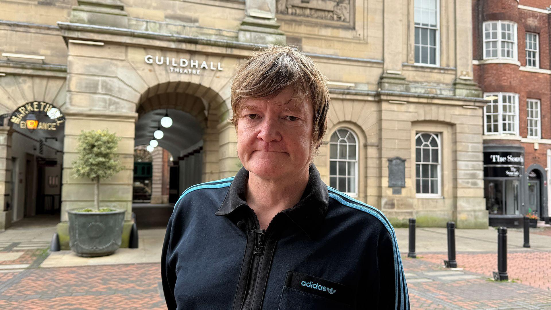 Photo of rejected trader Micky Sheehan standing outside Derby's Market Hall