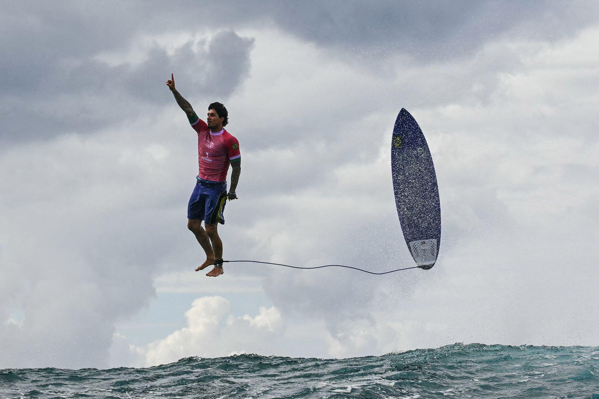 The third day of the surfing Olympic event in French Polynesia at Teahupo’o, Brazilian surfer Gabriel Medina gets the biggest wave of the competition and celebrates in a unique position by thanking God. July 29, 2024