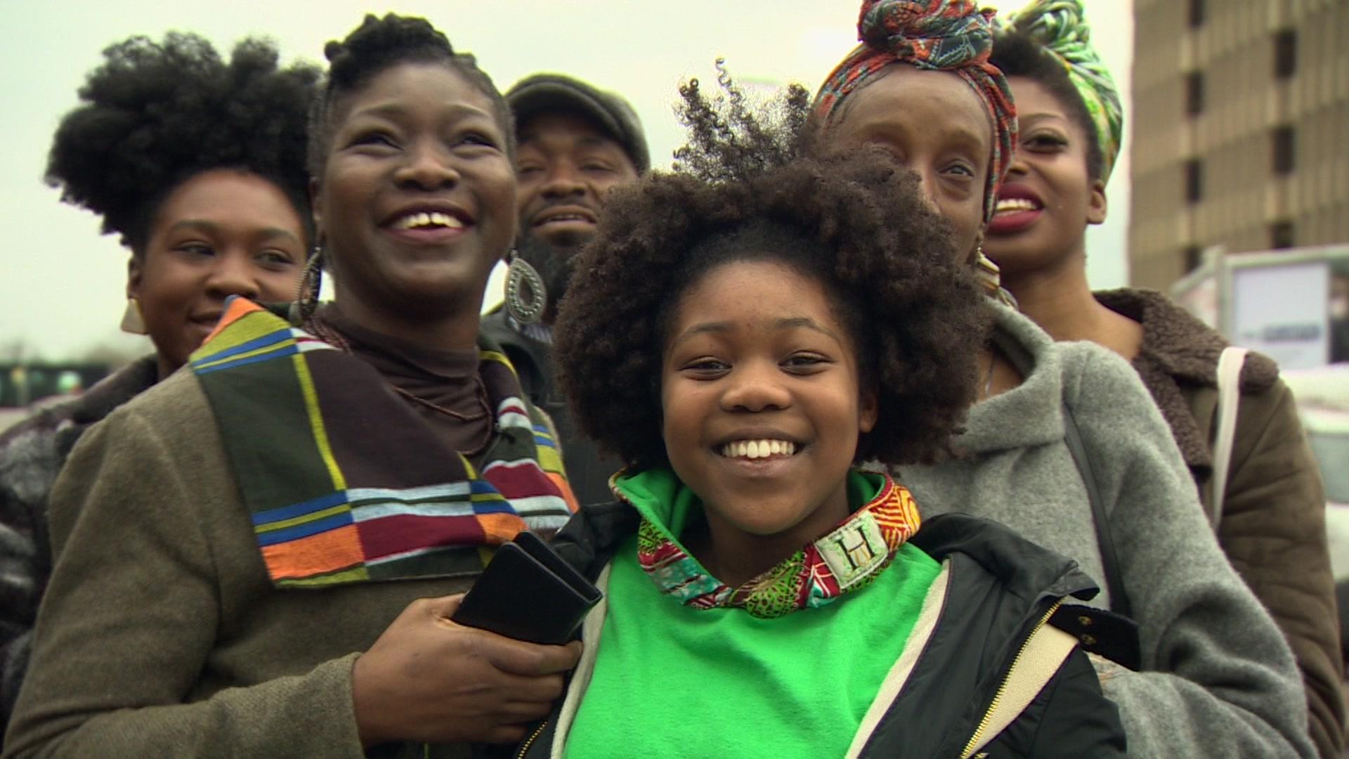 Siirah, her mother and friends at the switching on of the advert