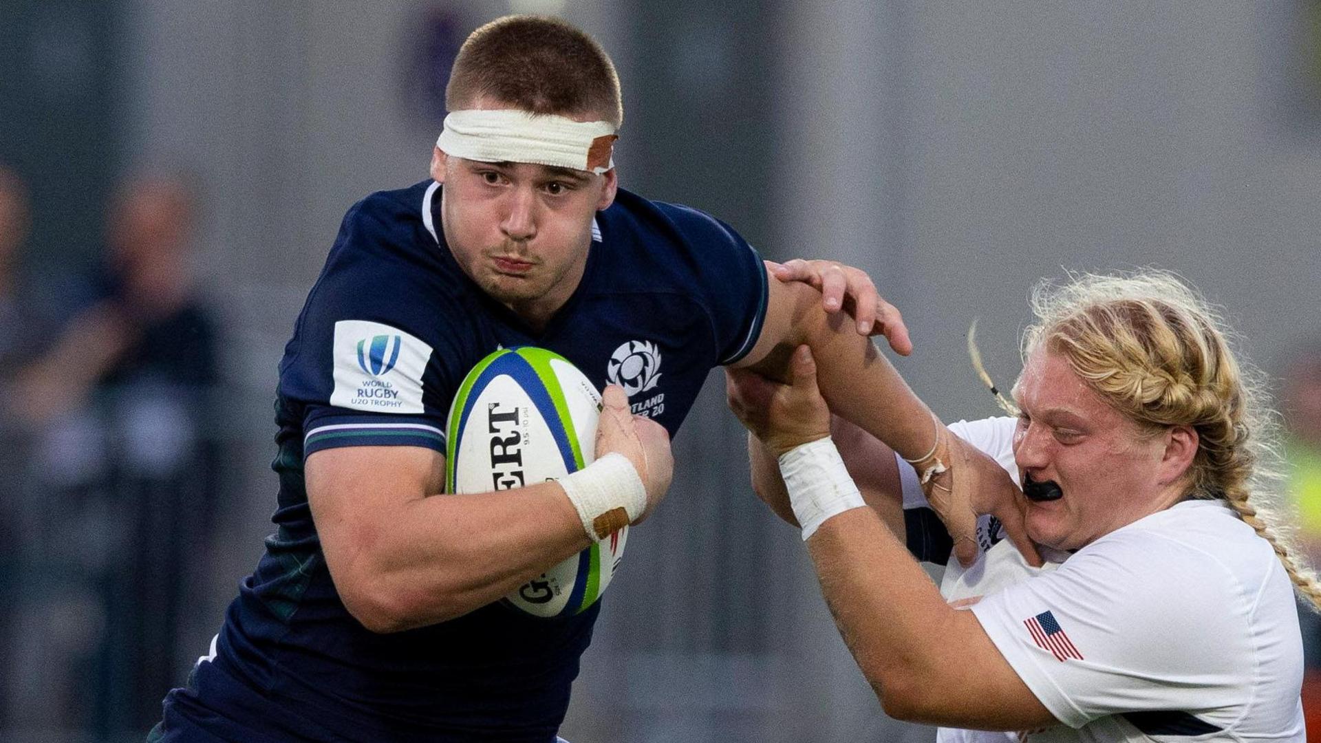 Freddy Douglas carries the ball for Scotland