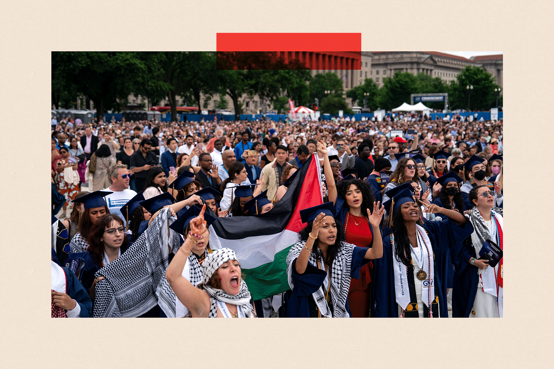 Students protest as they walk out from the George Washington University