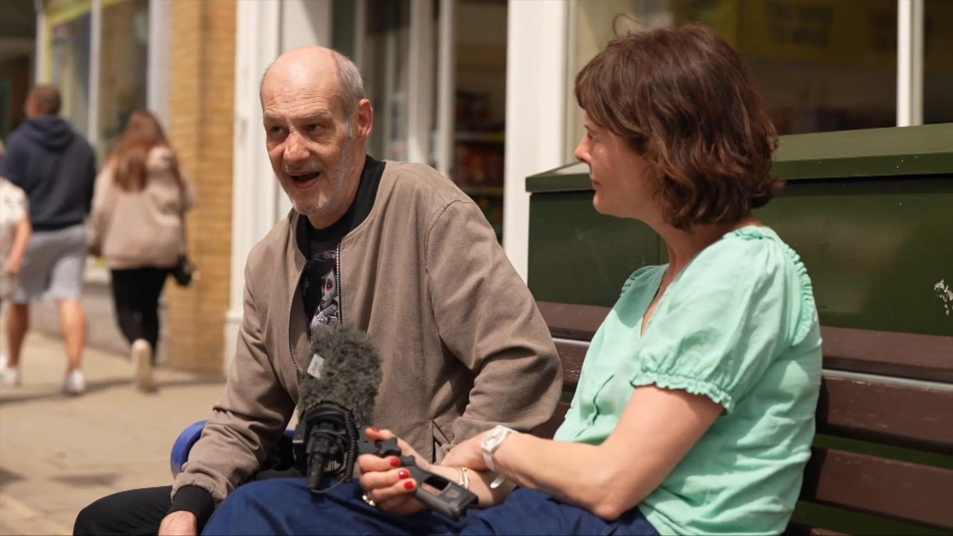 A man being interviewed by a BBC reporter