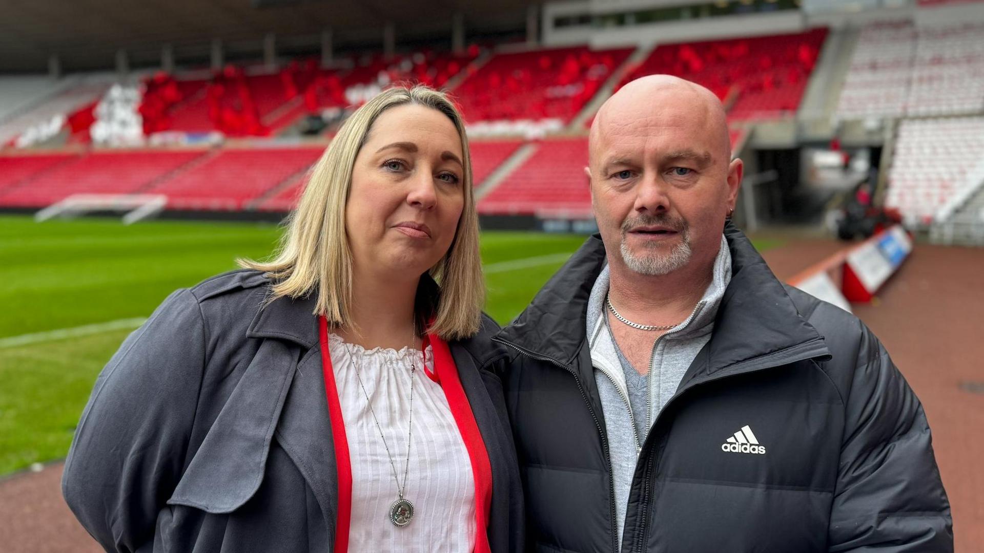 Tanya and Simon Brown standing inside the Stadium of Light