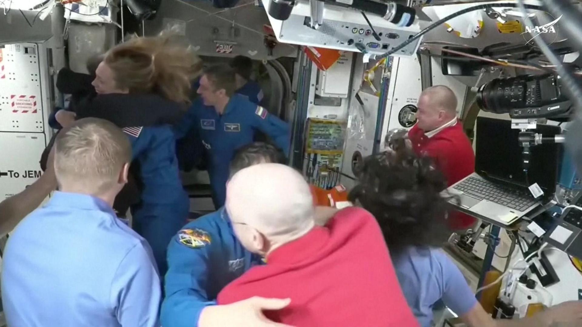 Hatch opens as replacements for NASA's two stranded astronauts arrive at the ISS