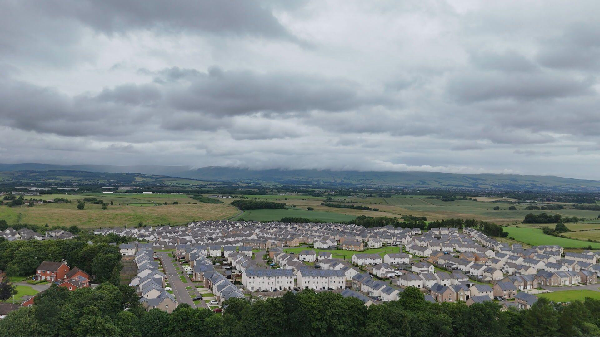 An aerial view of dozens of homes in the Robroyston area