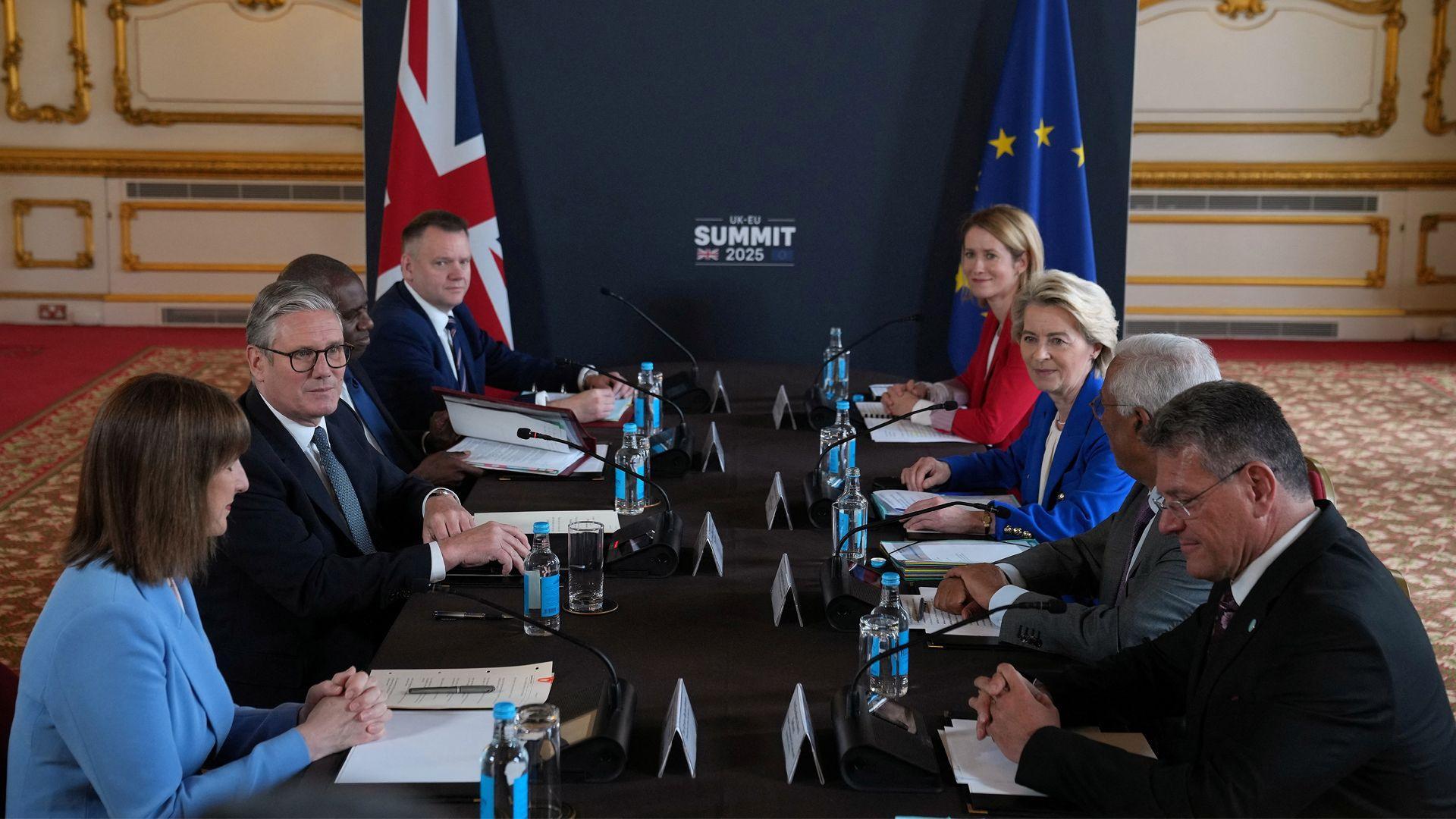 UK and EU leaders talk around a table.