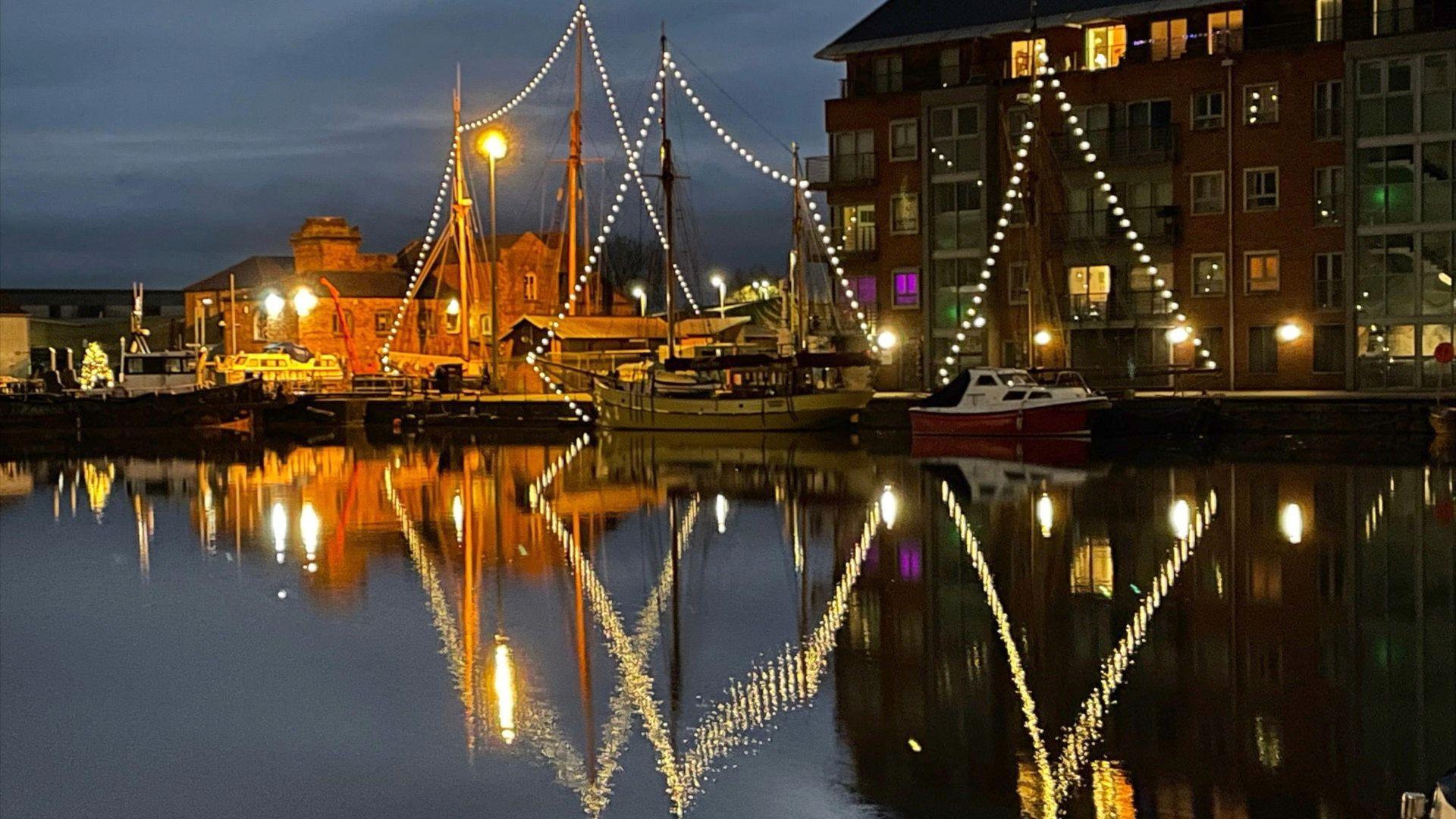 Christmas lights reflecting on Gloucester Docks.