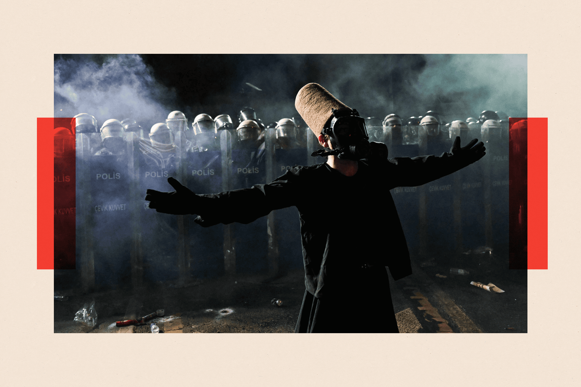 A protester dressed as a whirling dervish and wearing a gas mask 
