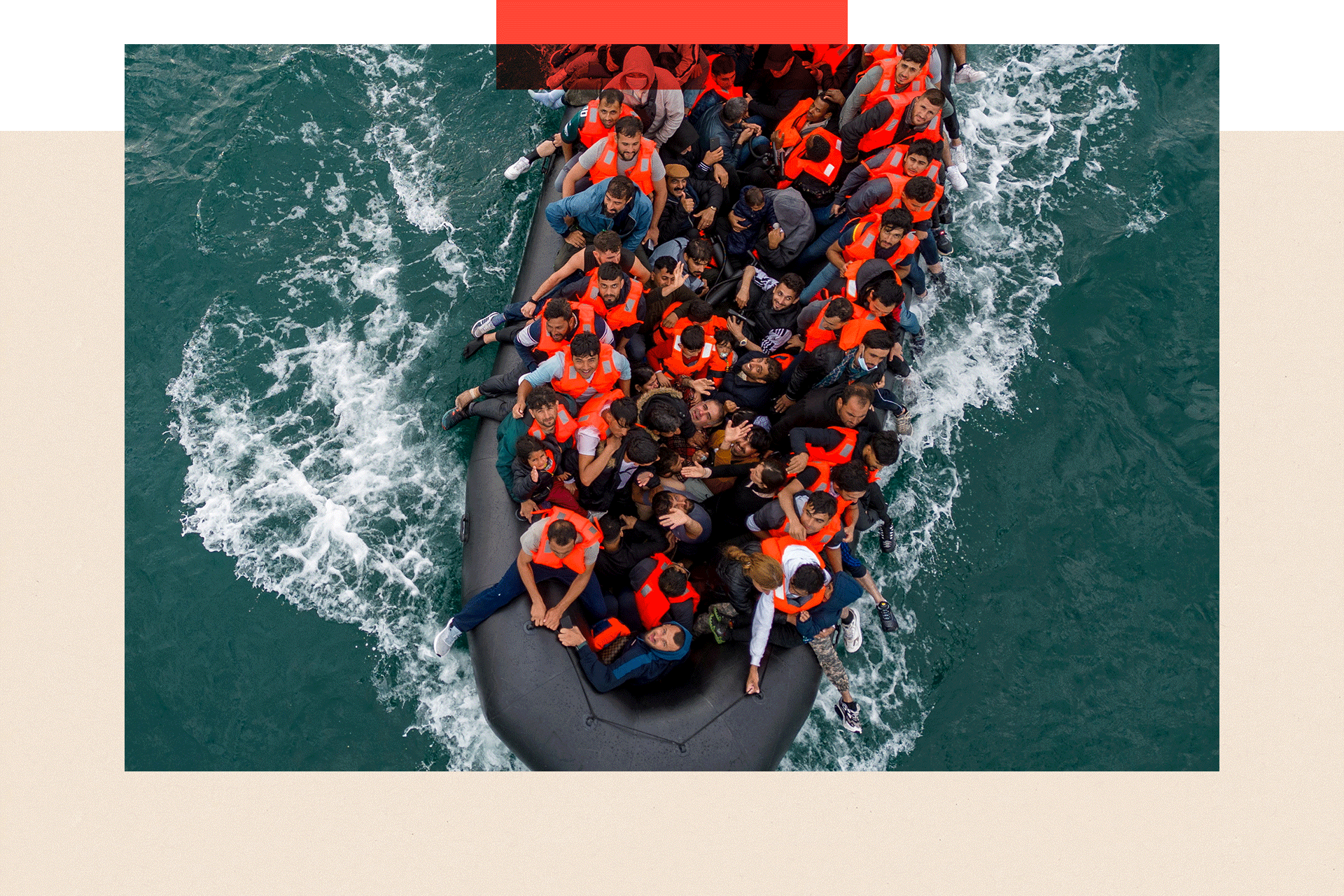 In this drone view an inflatable dinghy carrying migrants makes its way towards England in the English Channel