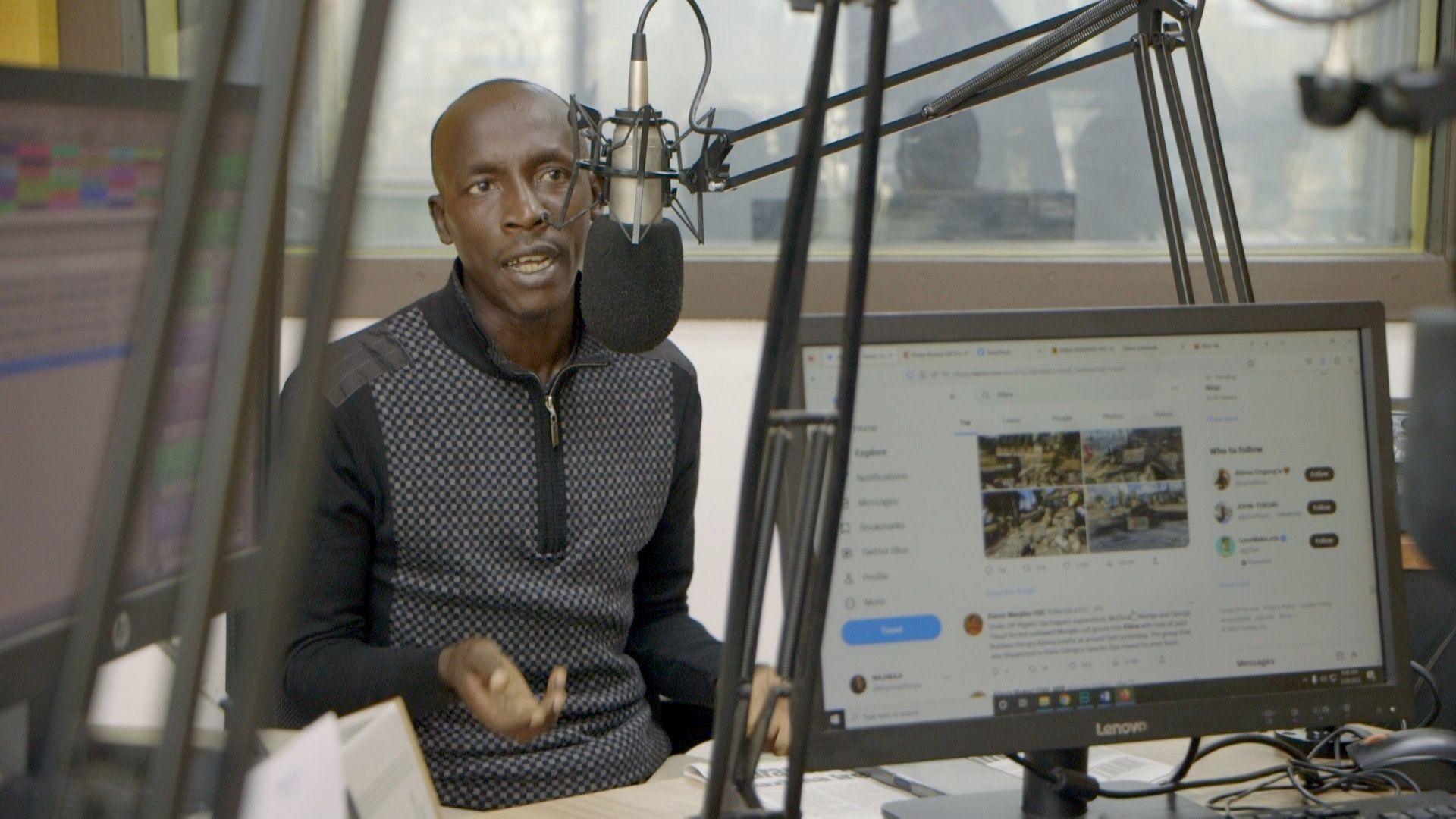 Man talking on a microphone