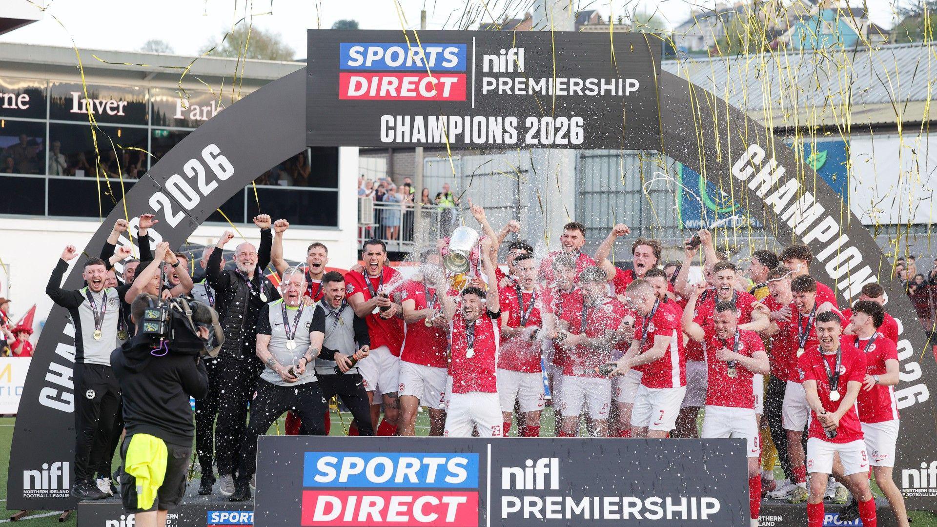 Larne win title