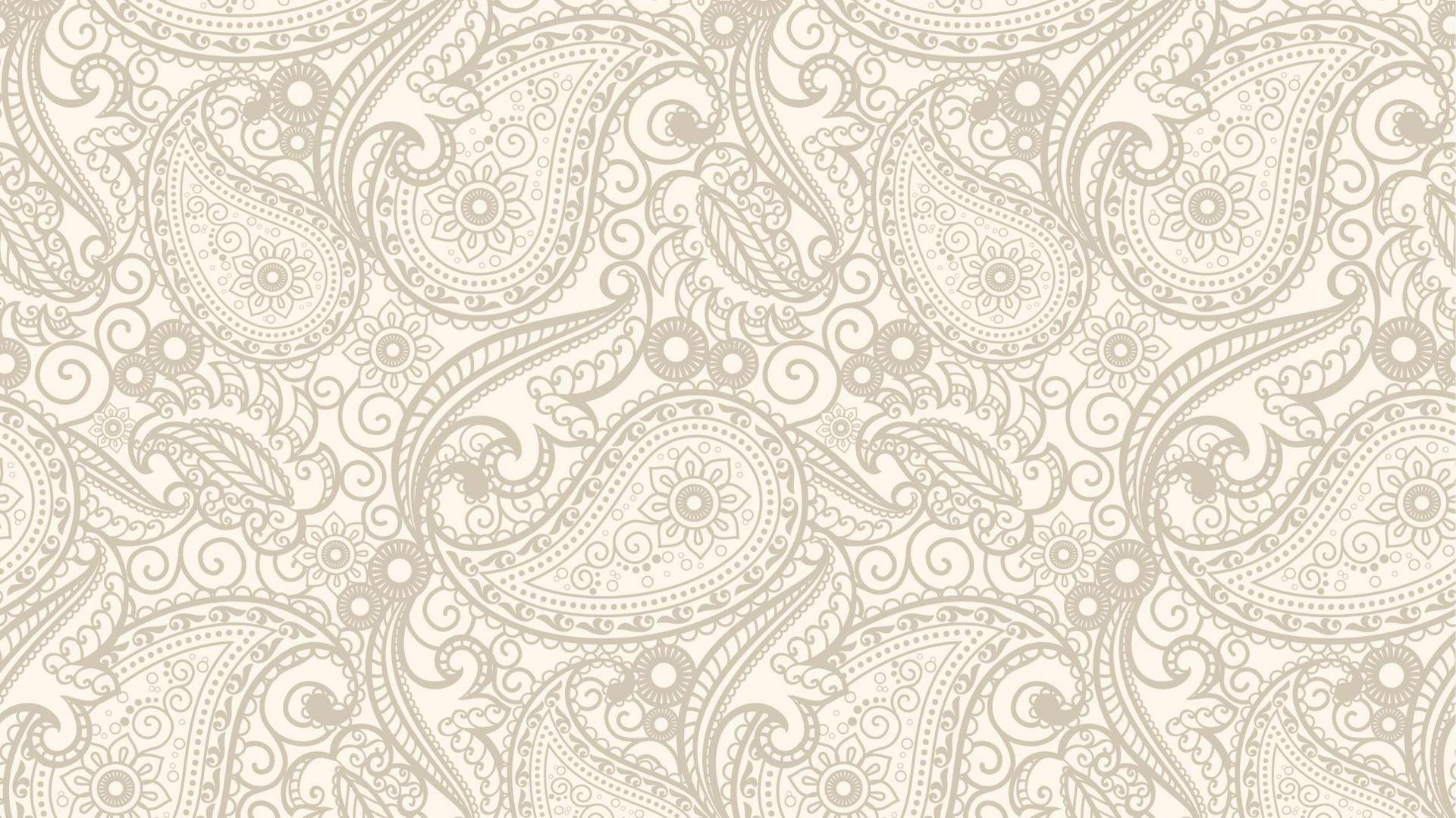 Gold and cream swirling and floral paisley pattern